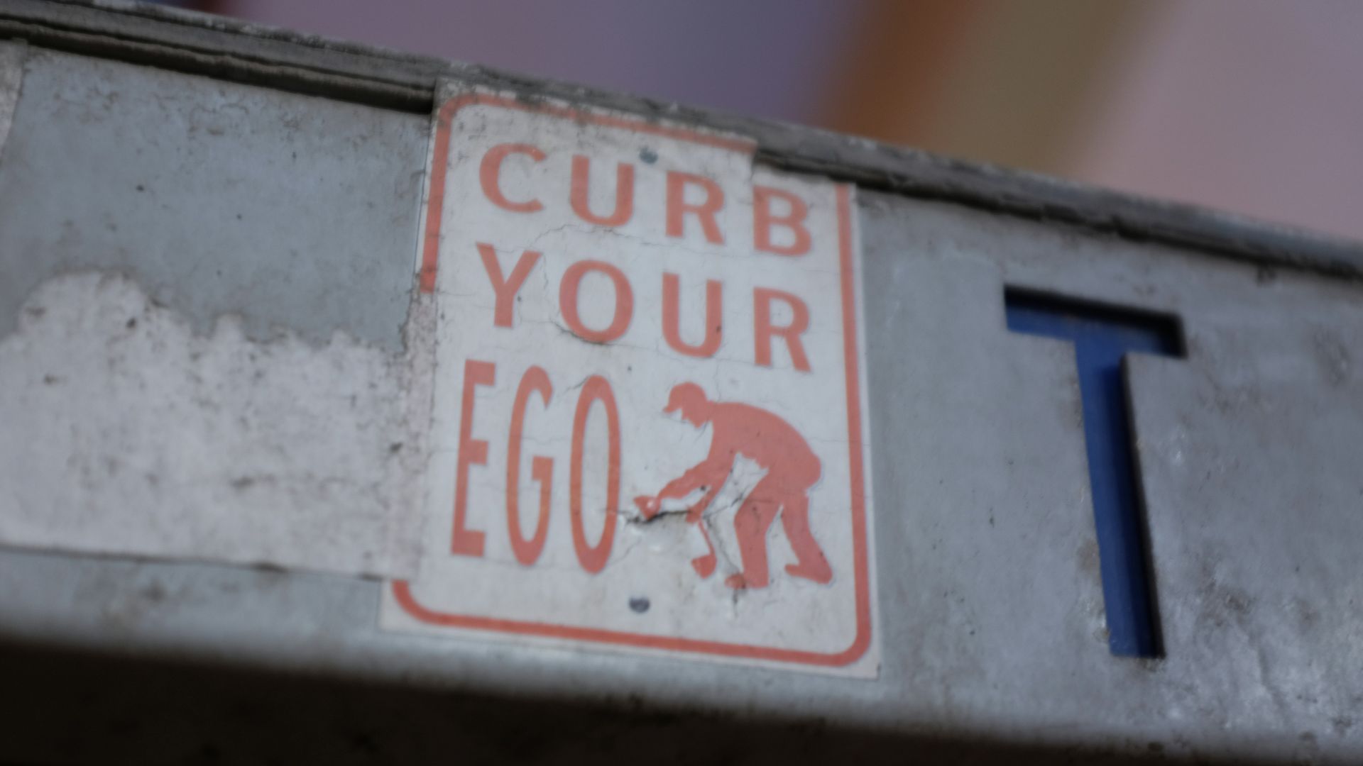 a close up of a street sign on a pole