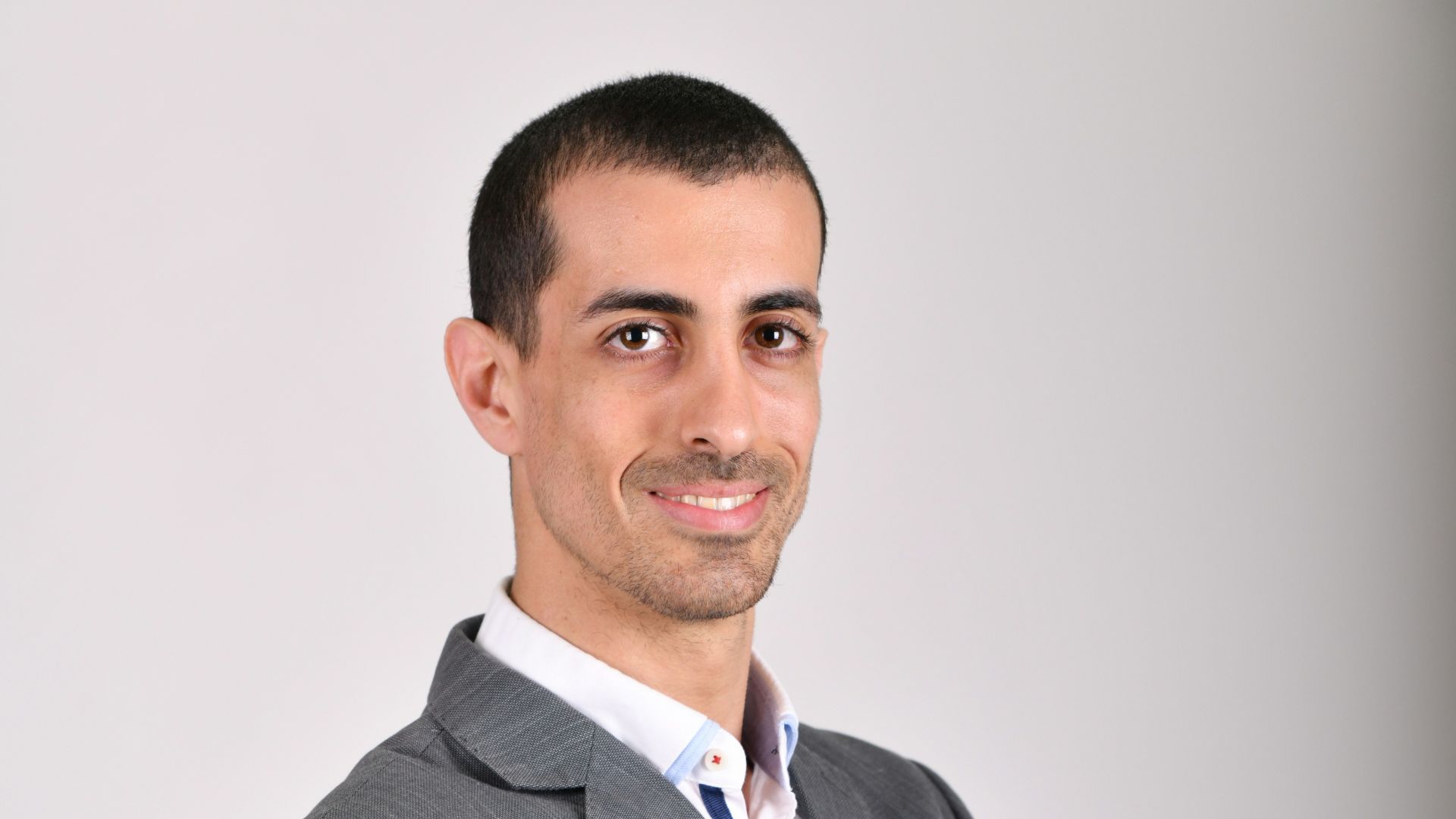 man wearing gray blazer