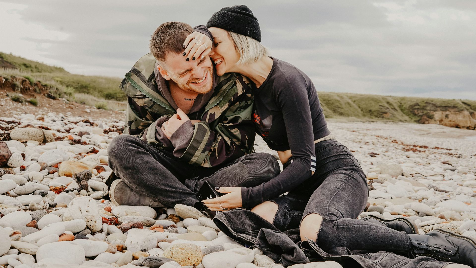 unknown persons sitting outdoors