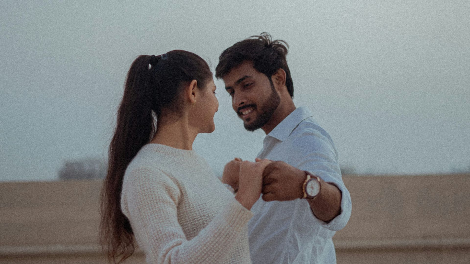 a man and a woman standing next to each other