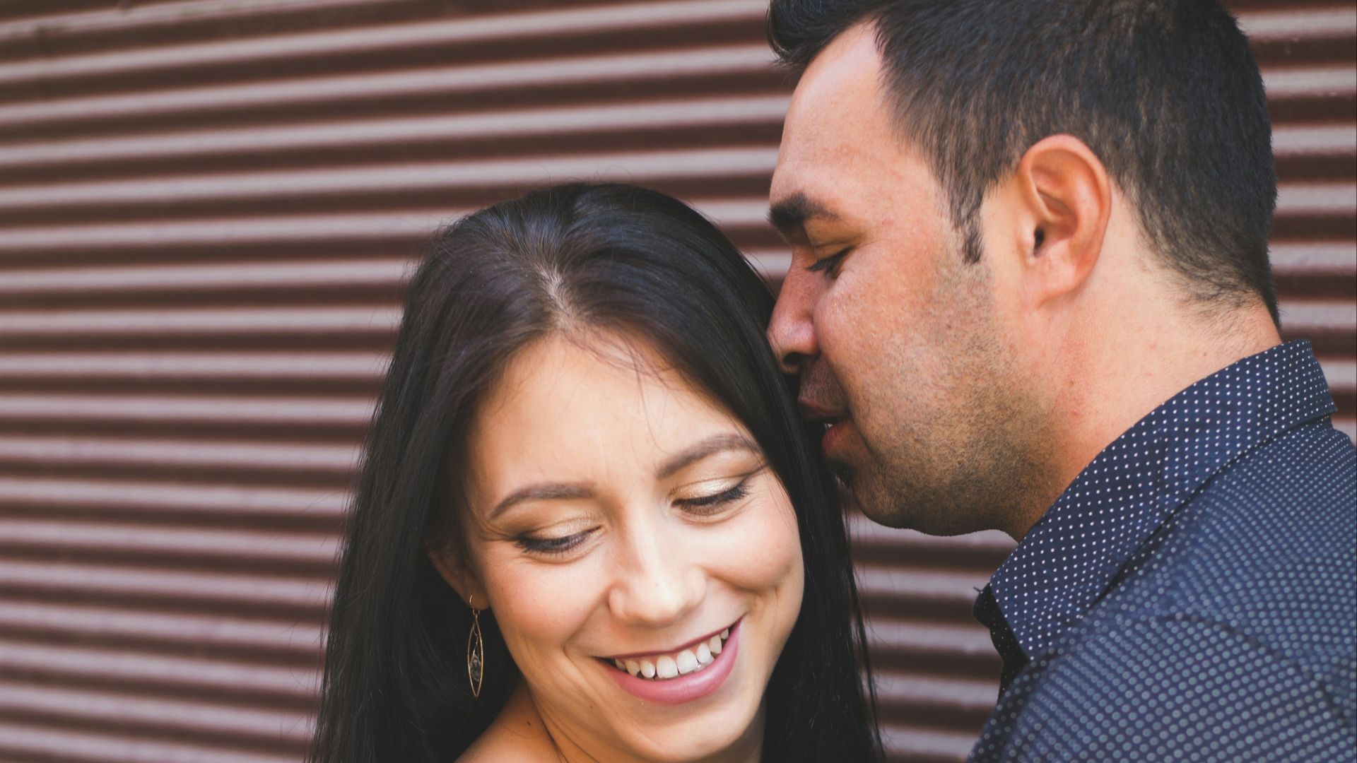 a man and a woman standing next to each other
