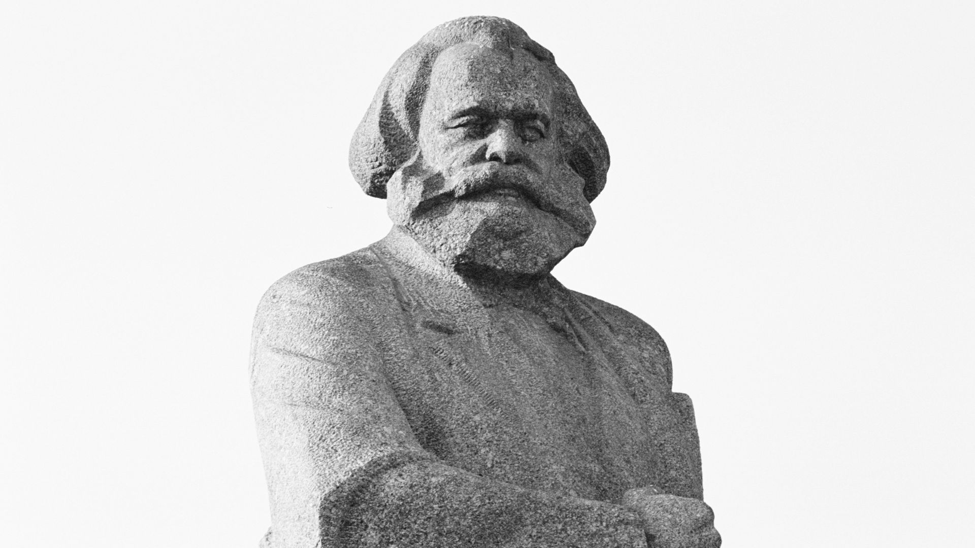 gray scale photo of man statue