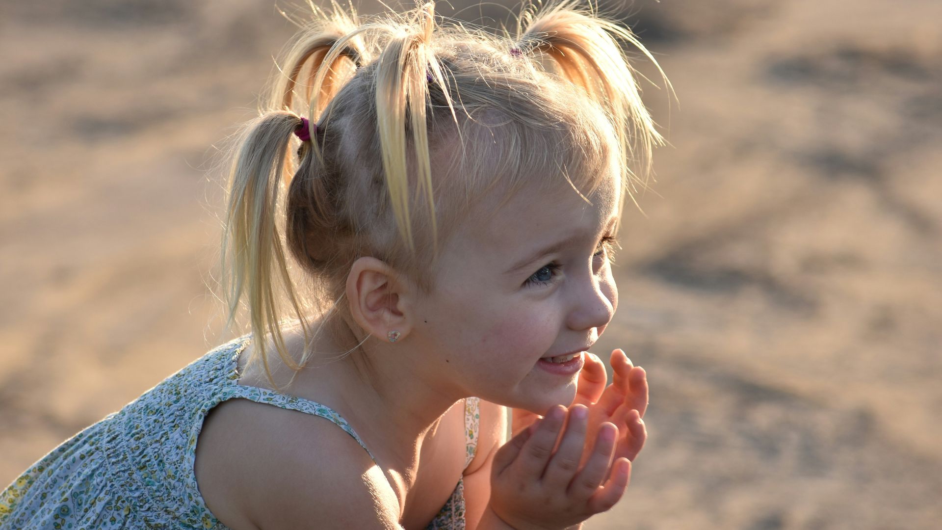 girl in blue sleeveless dress