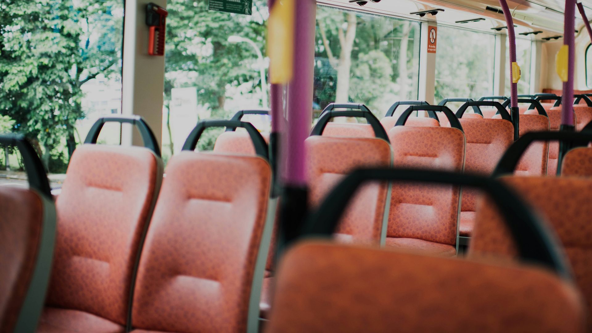 orange vehicle seat inside vehicle