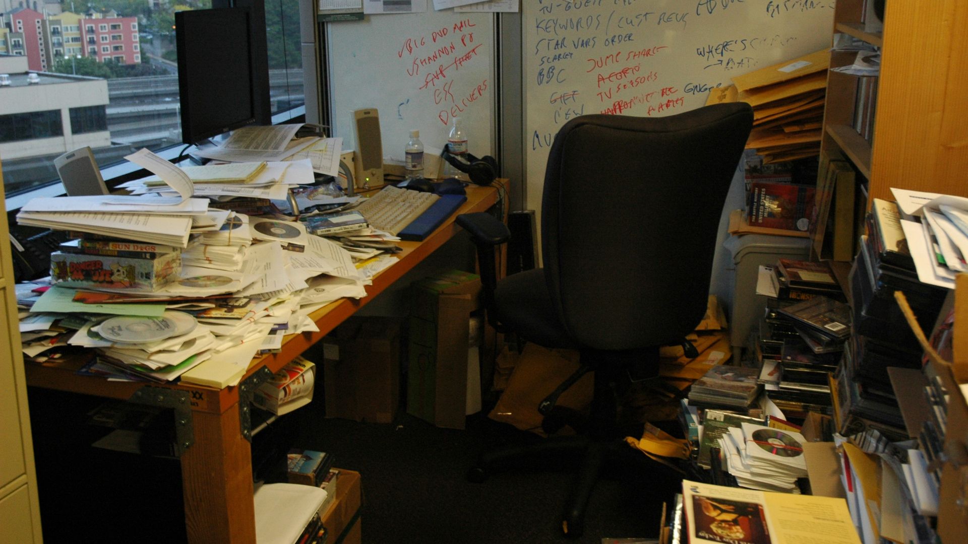 office table with pile of papers