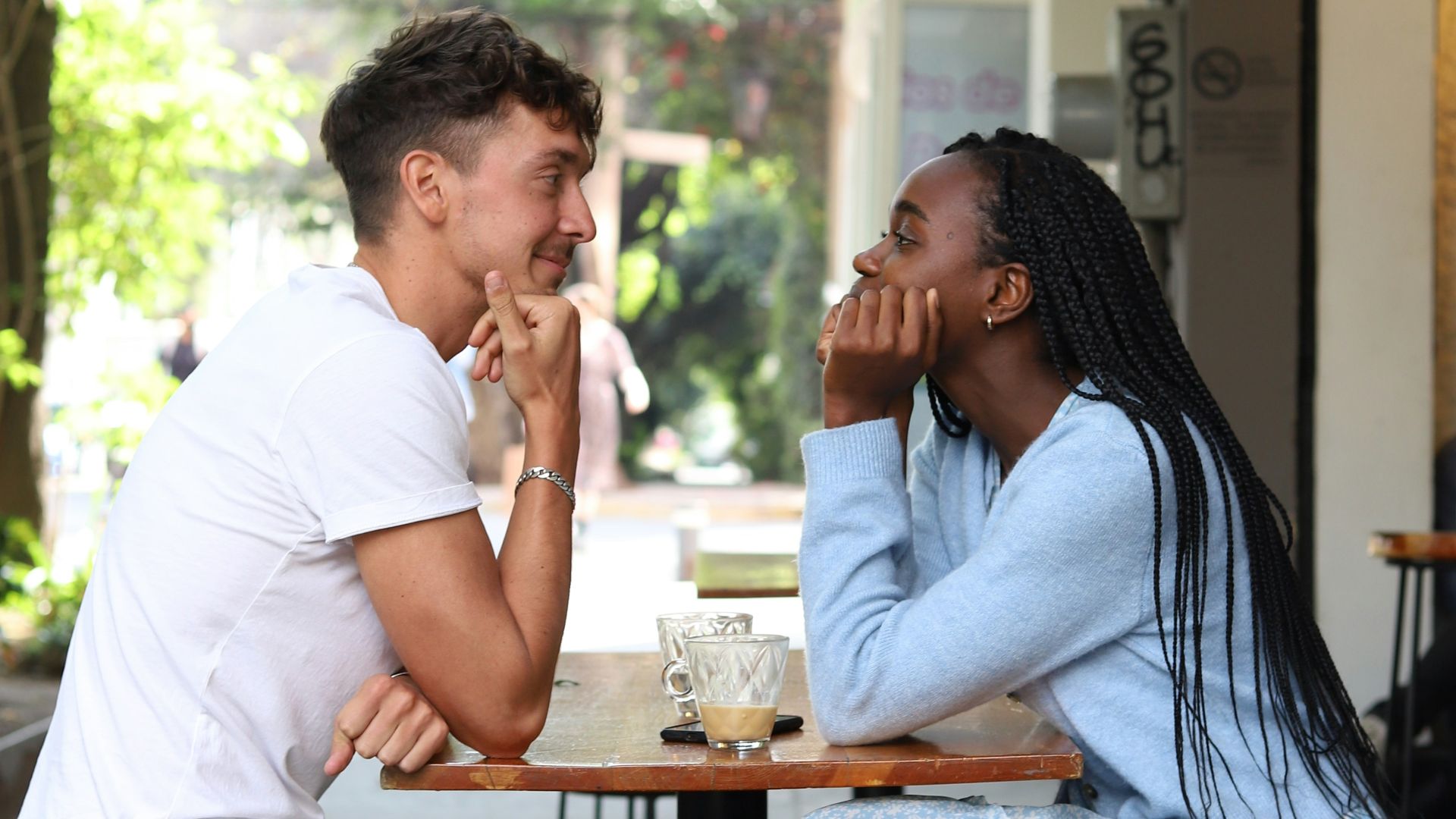 a man and a woman sitting at a table