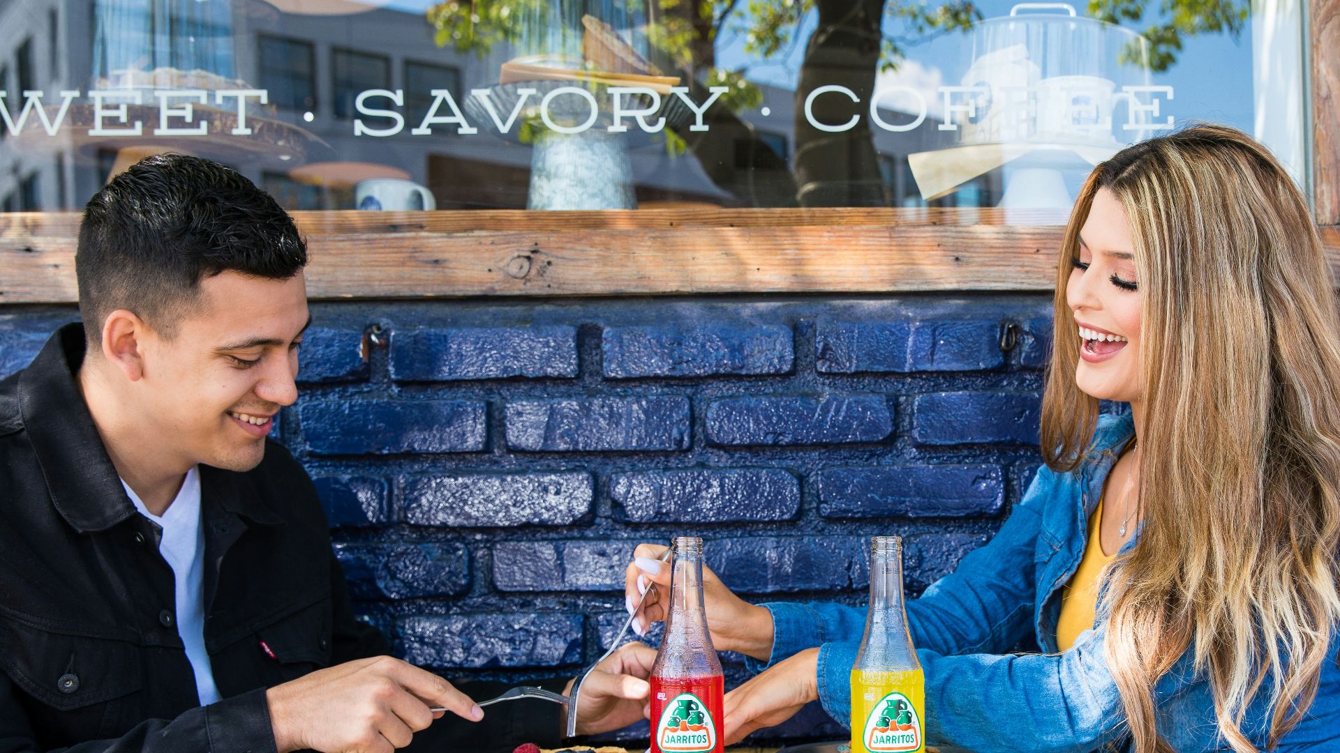 man and woman sitting at table