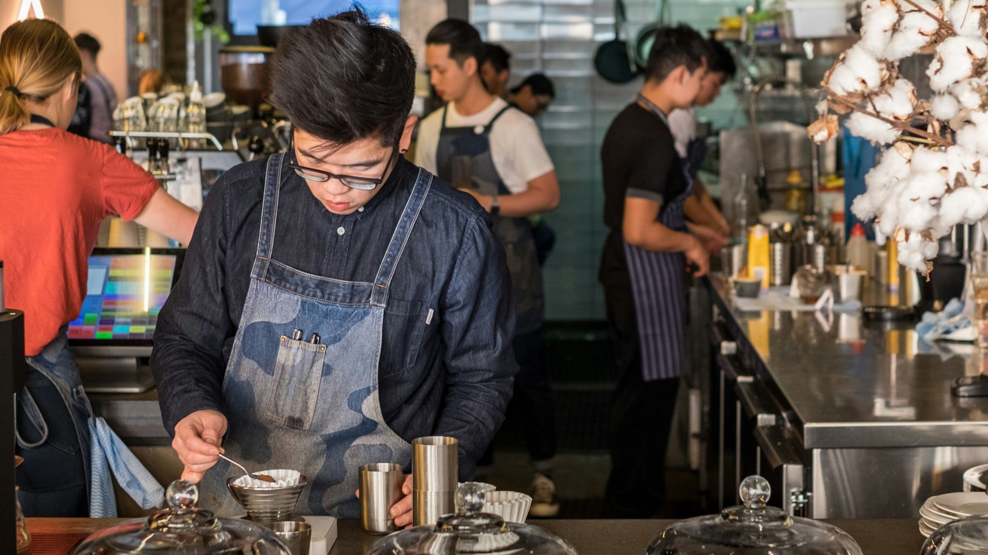 group of people in kitchen