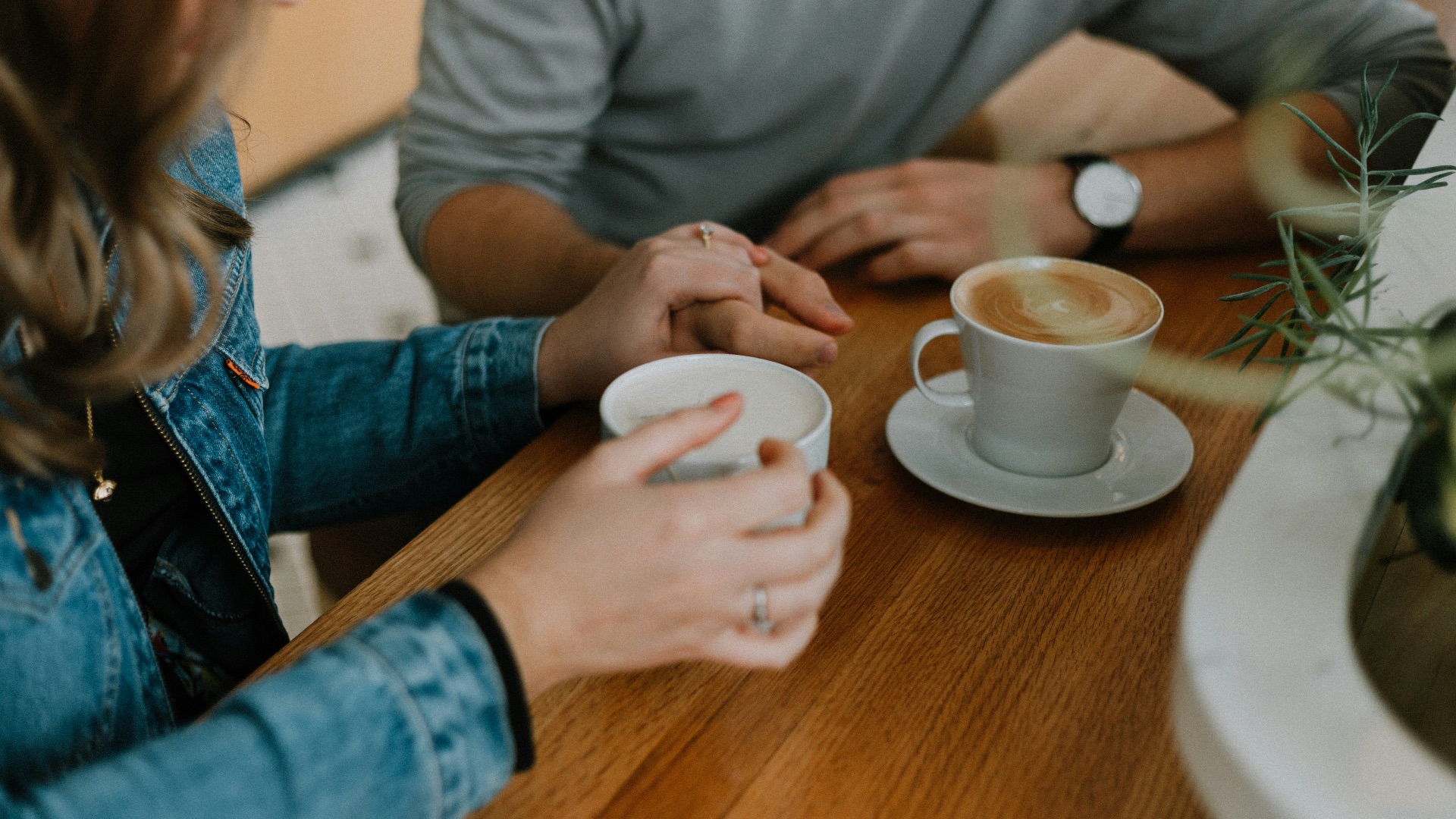 two mugs with coffee on table