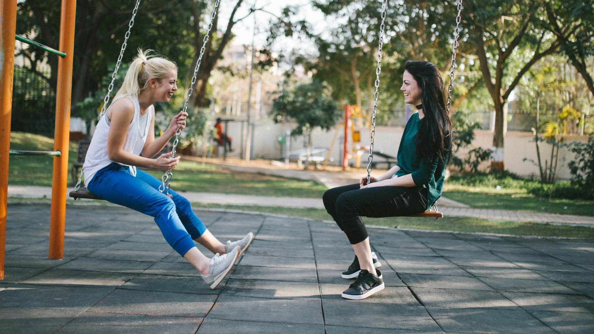 woman sitting on swing