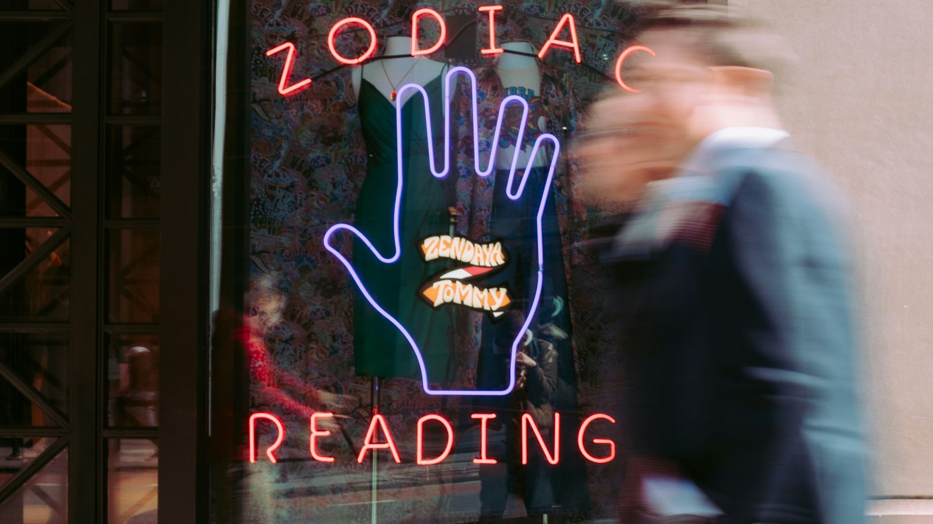 two men walking near the building