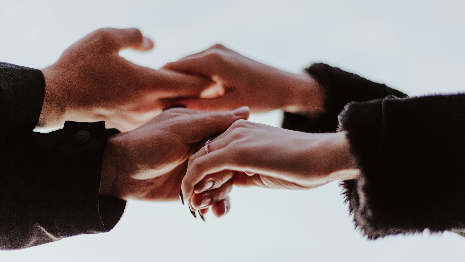 view photography of person hands while holding