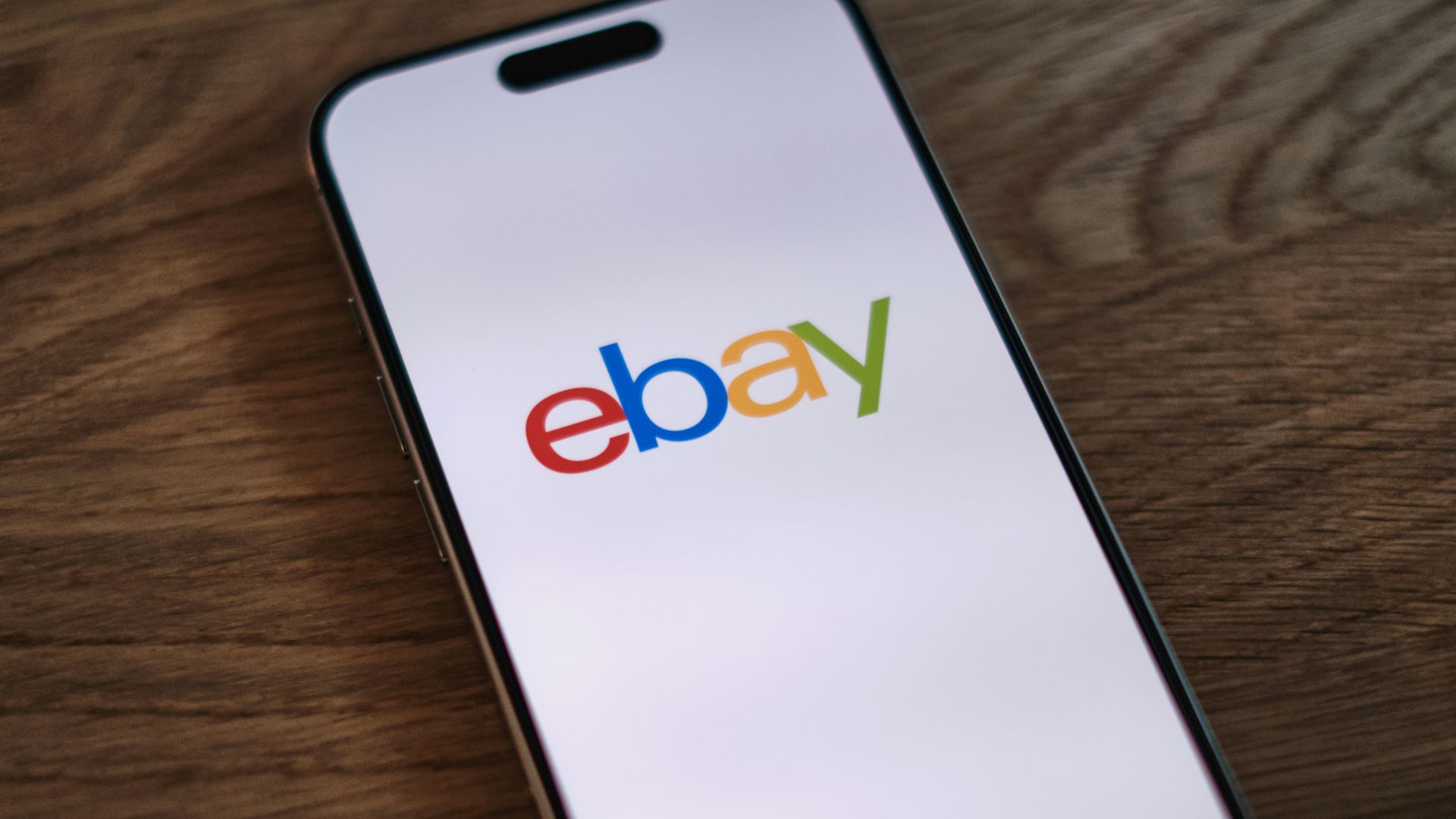 A close up of a cell phone on a table