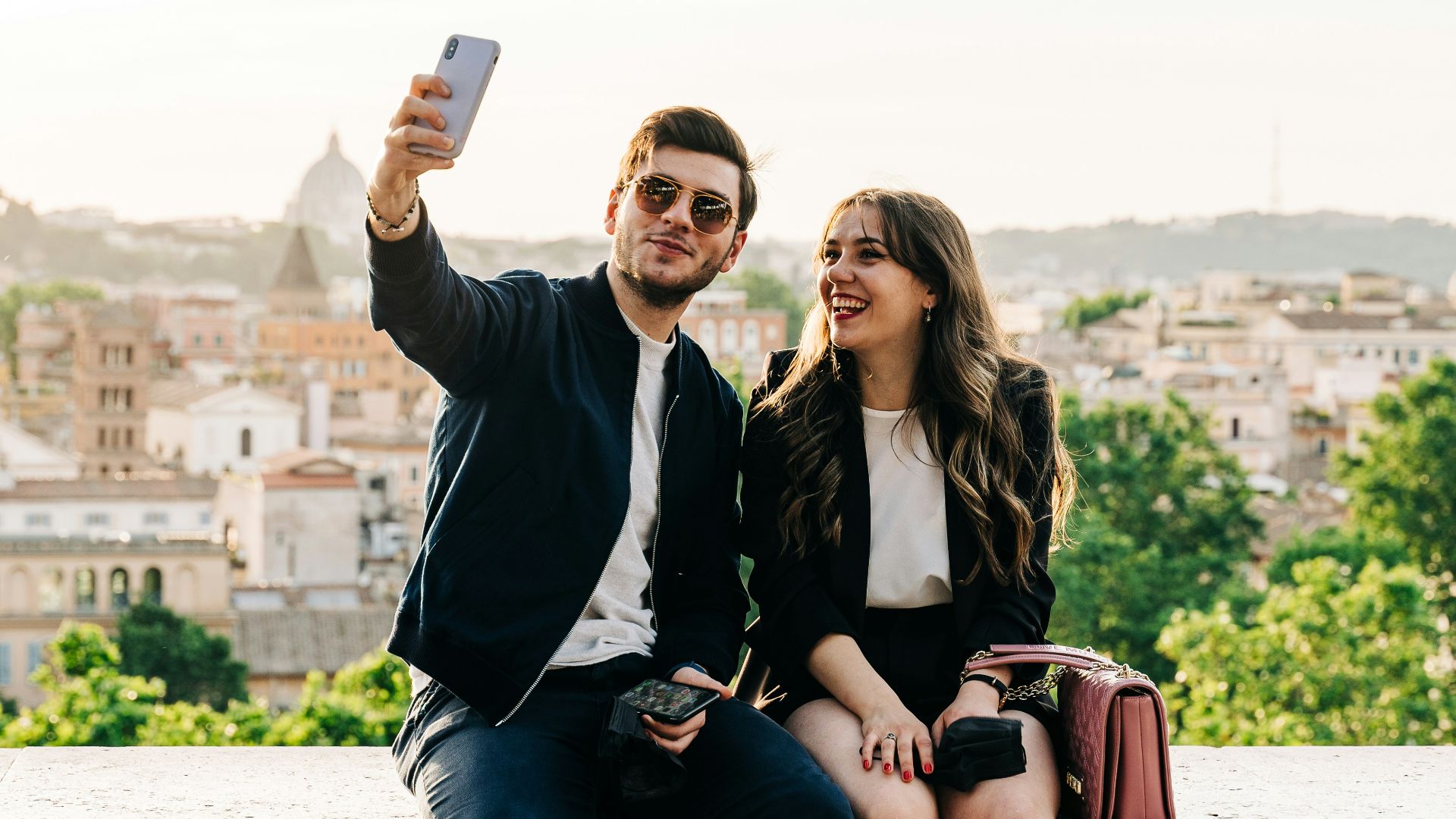 a man and a woman taking a selfie