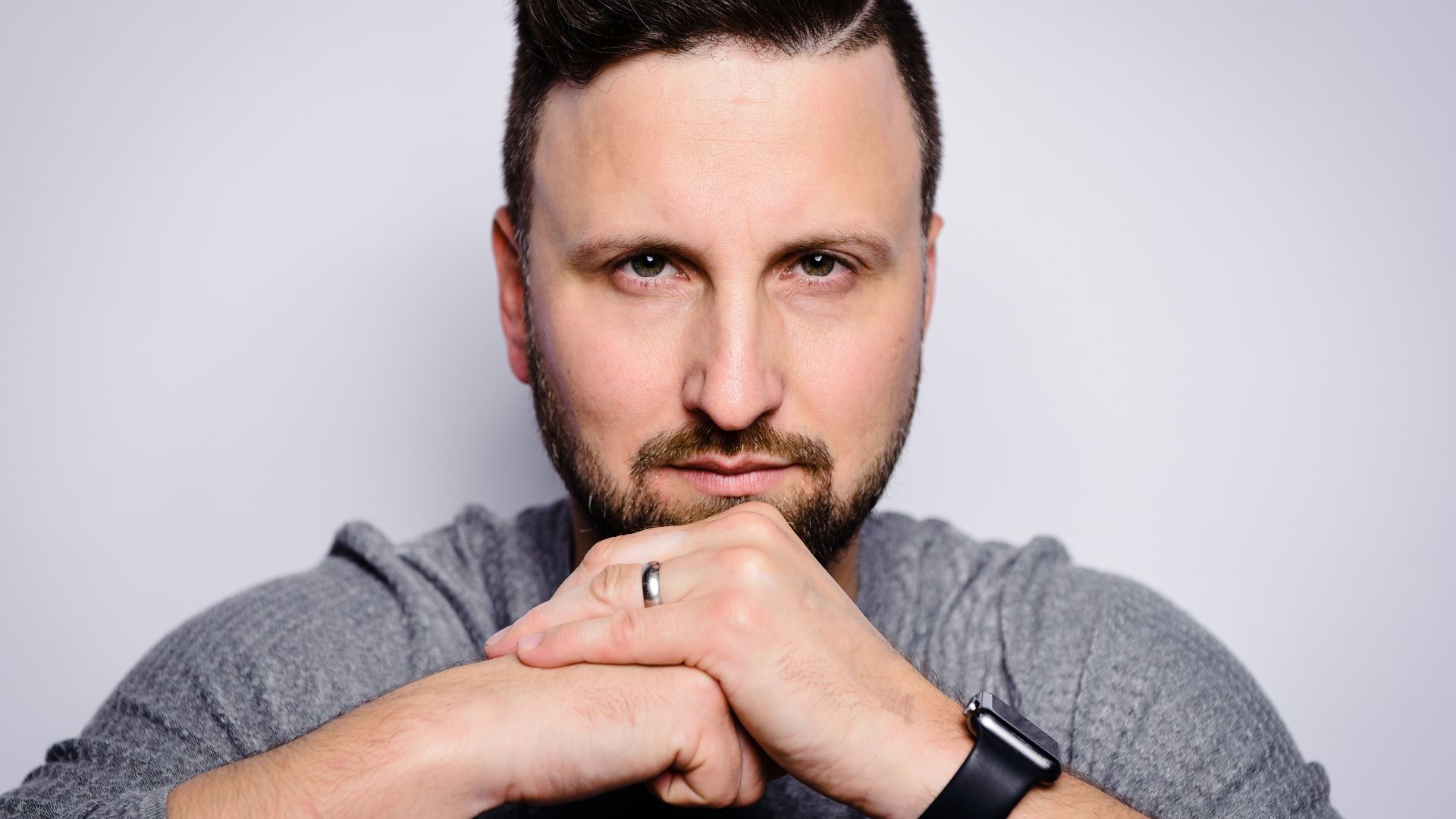 a man with a ring on his finger