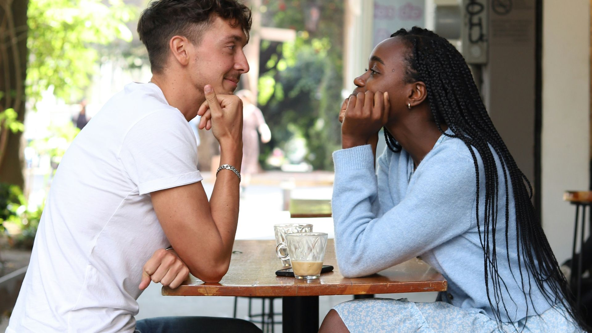 a man and a woman sitting at a table