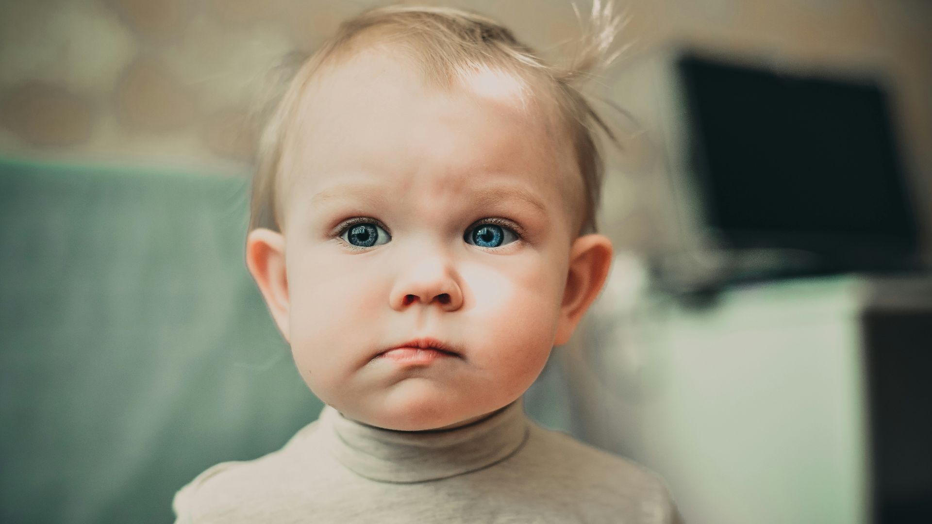 selective focus photography of baby