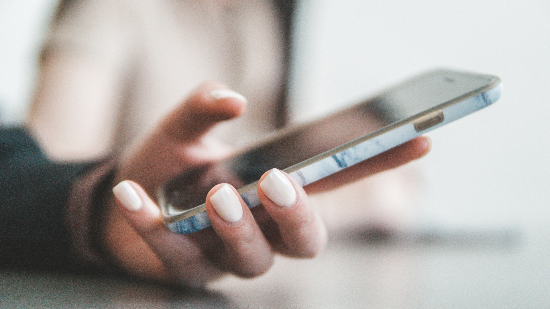 person holding black smartphone