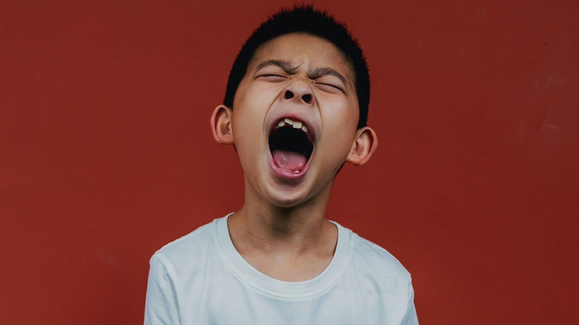 boy in white crew neck t-shirt