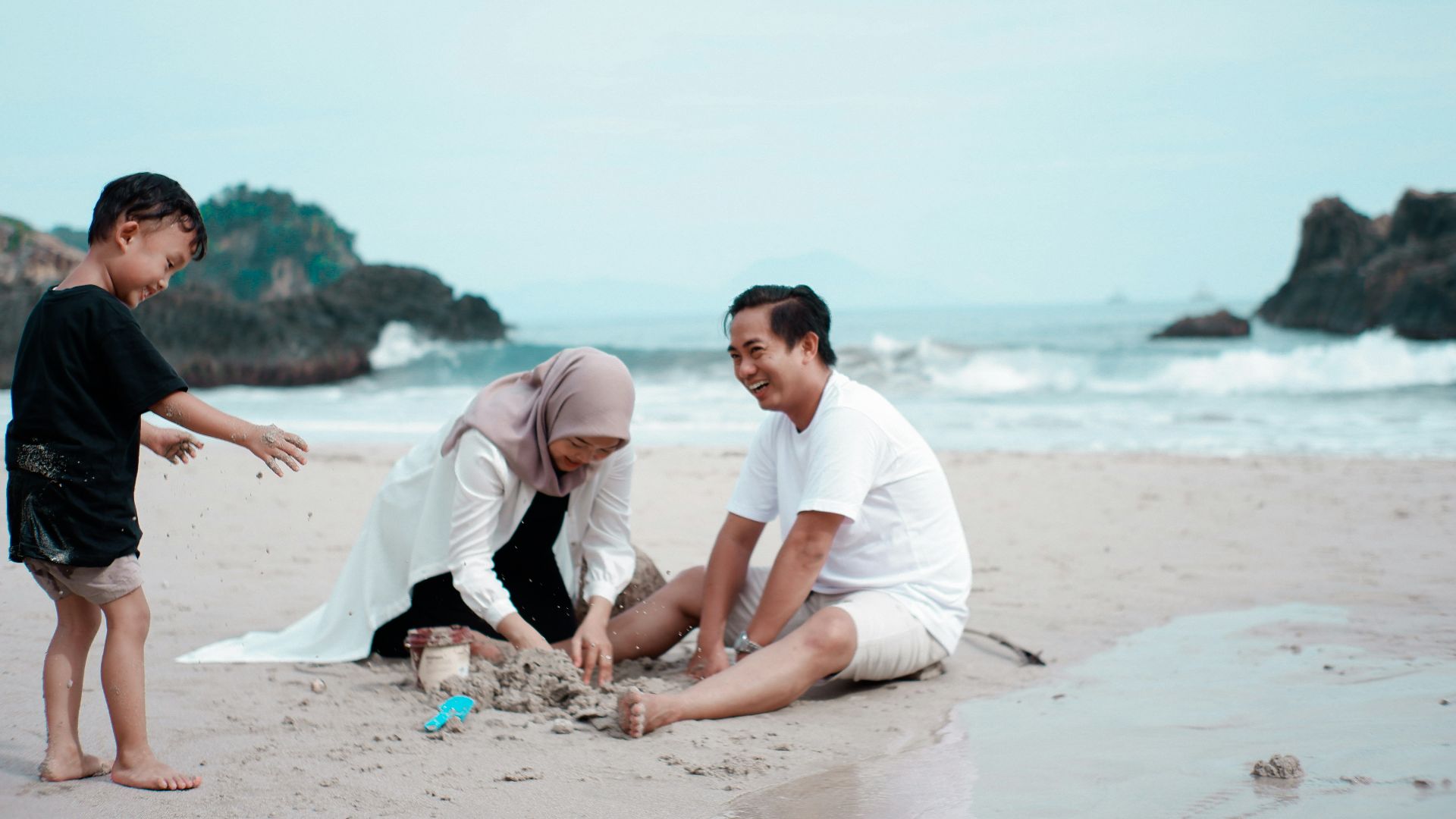 a group of men on a beach