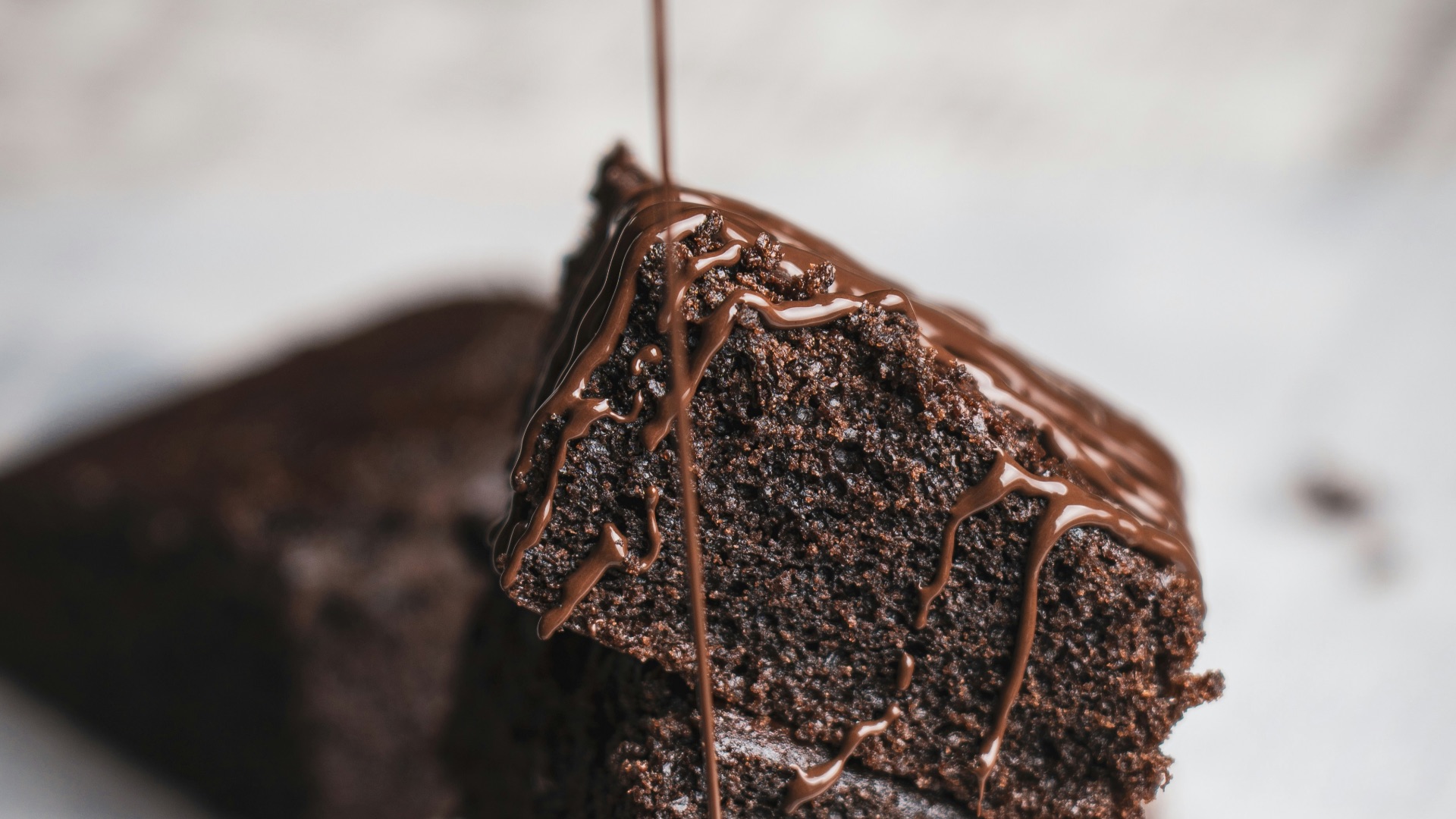 chocolate cake on white ceramic plate