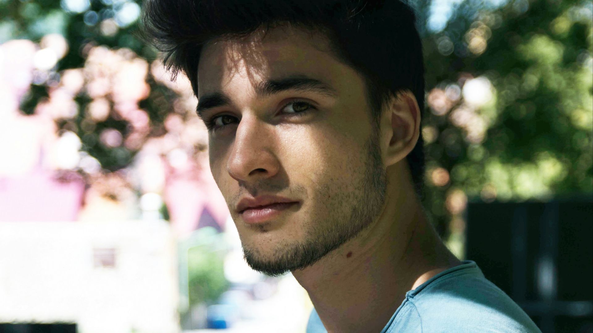 man standing near to tree