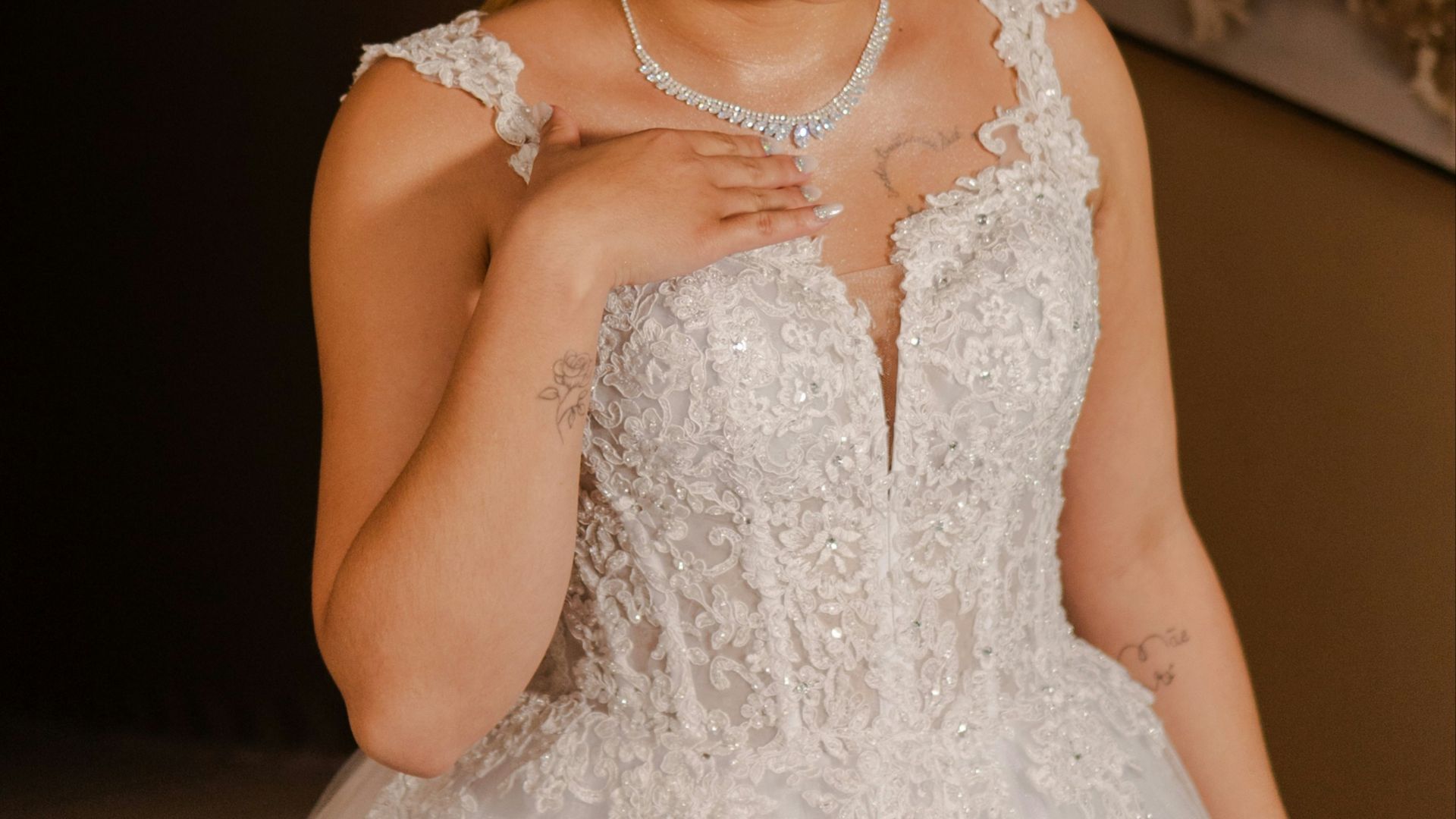 Young woman in a white formal dress and tiara