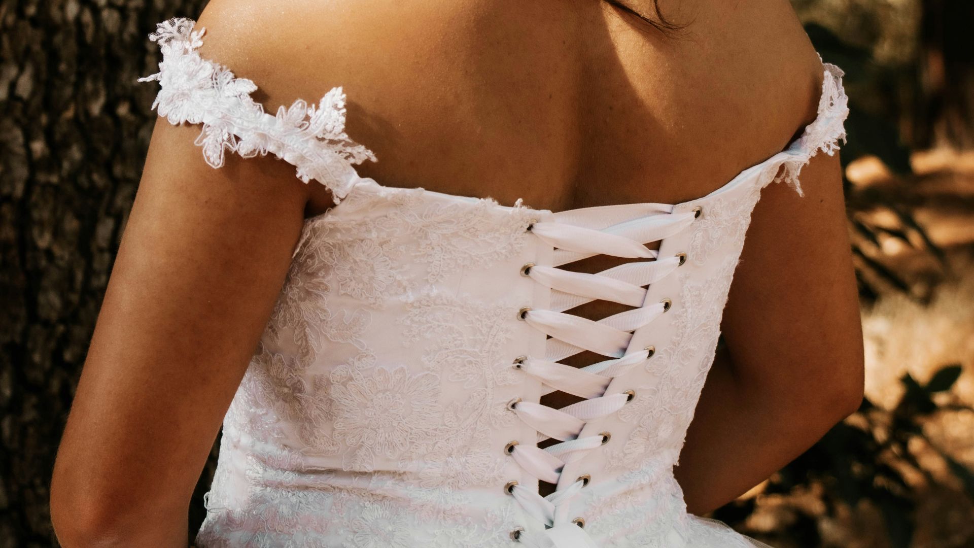 a woman wearing a white dress