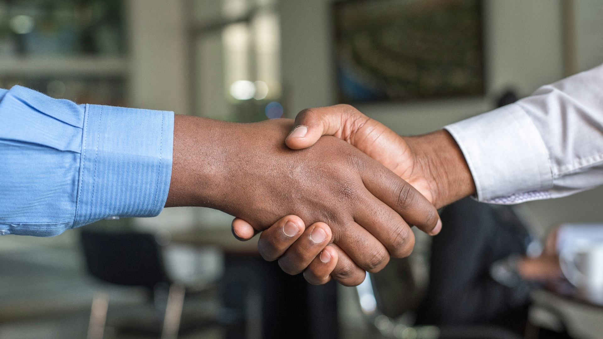two people shaking hands
