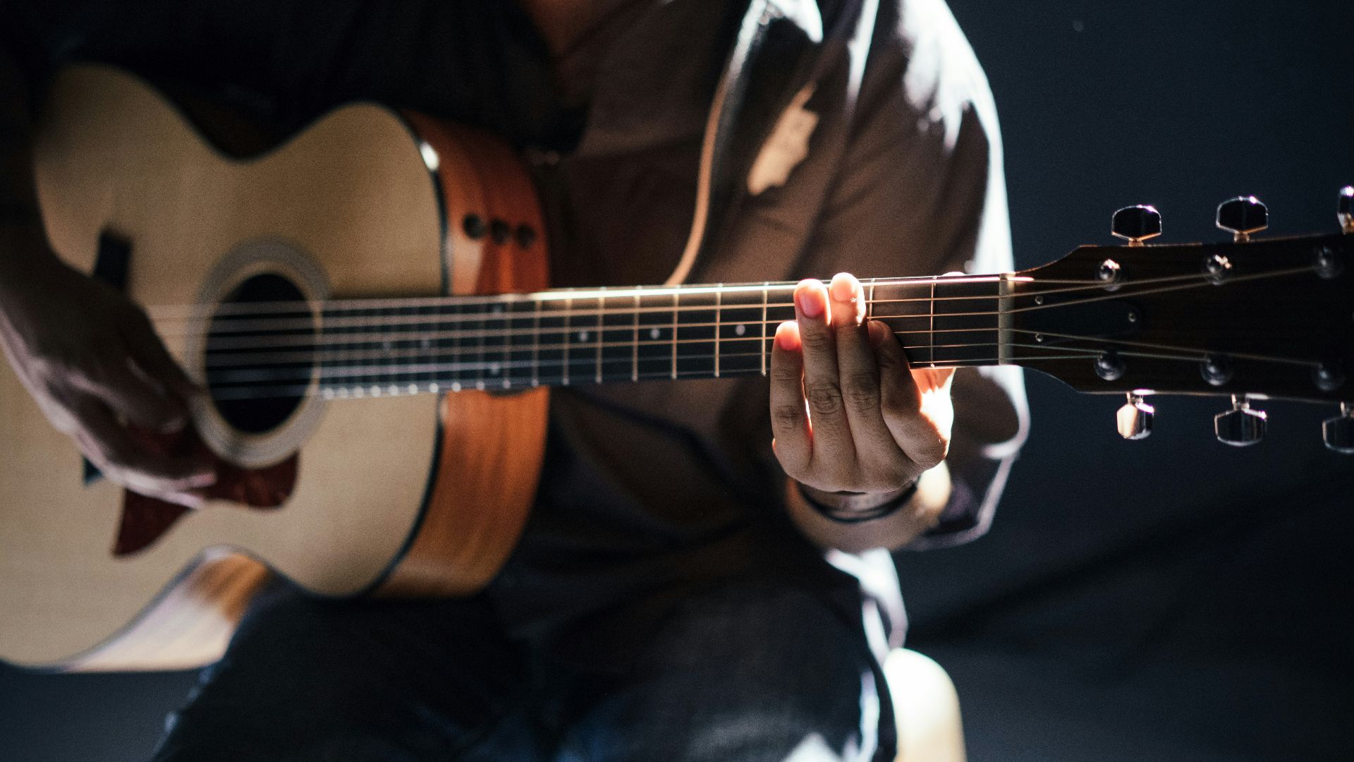 person playing guitar