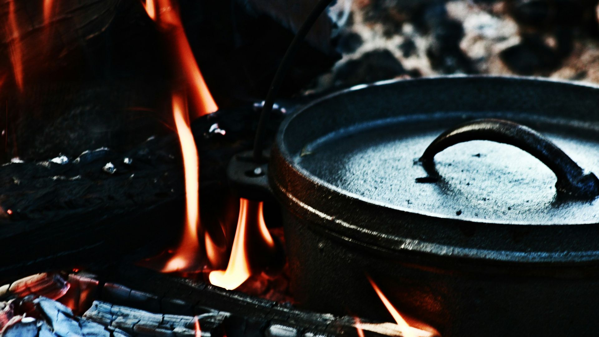 black round pot on fire