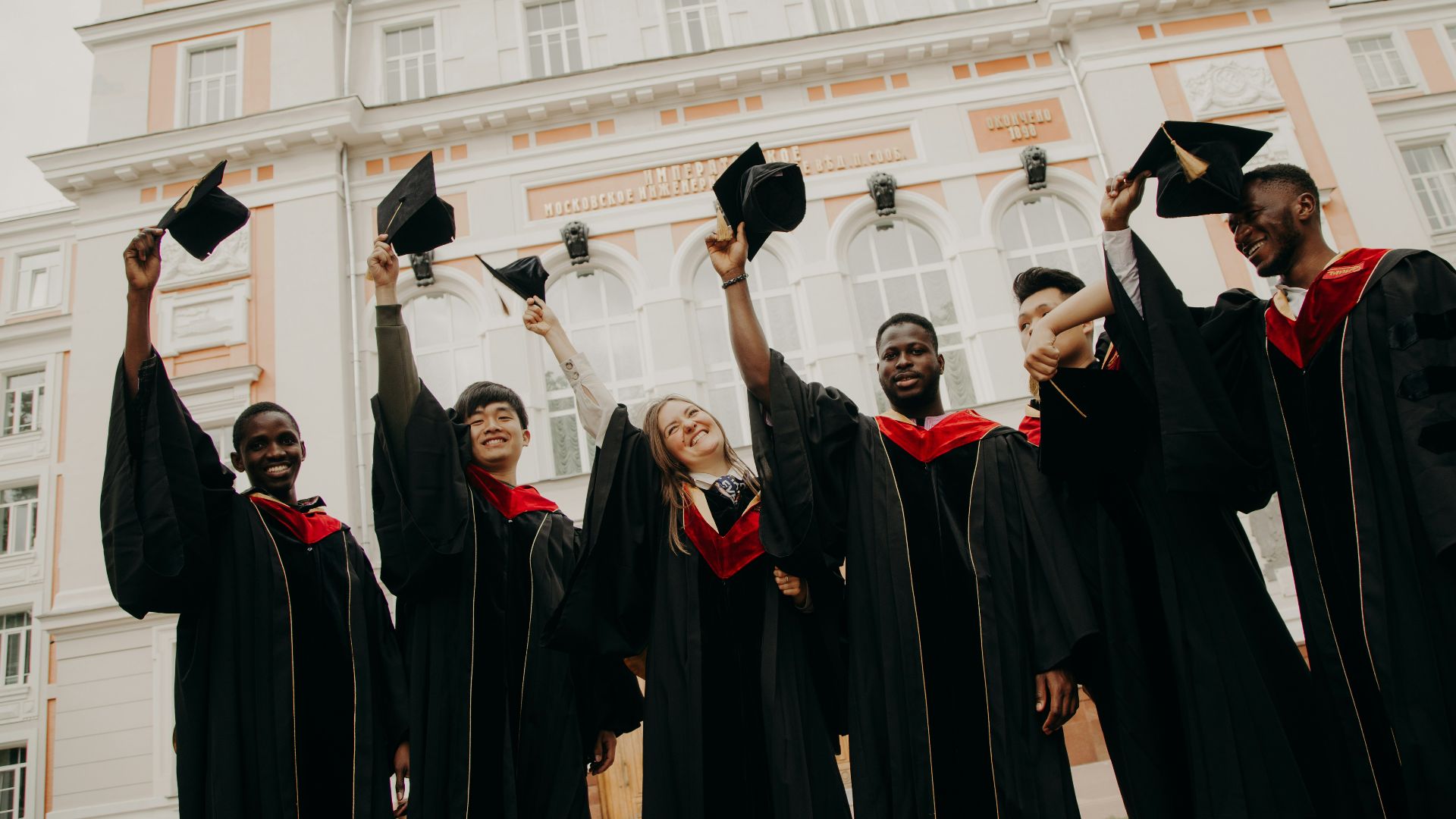 group of people wearing black academic dress