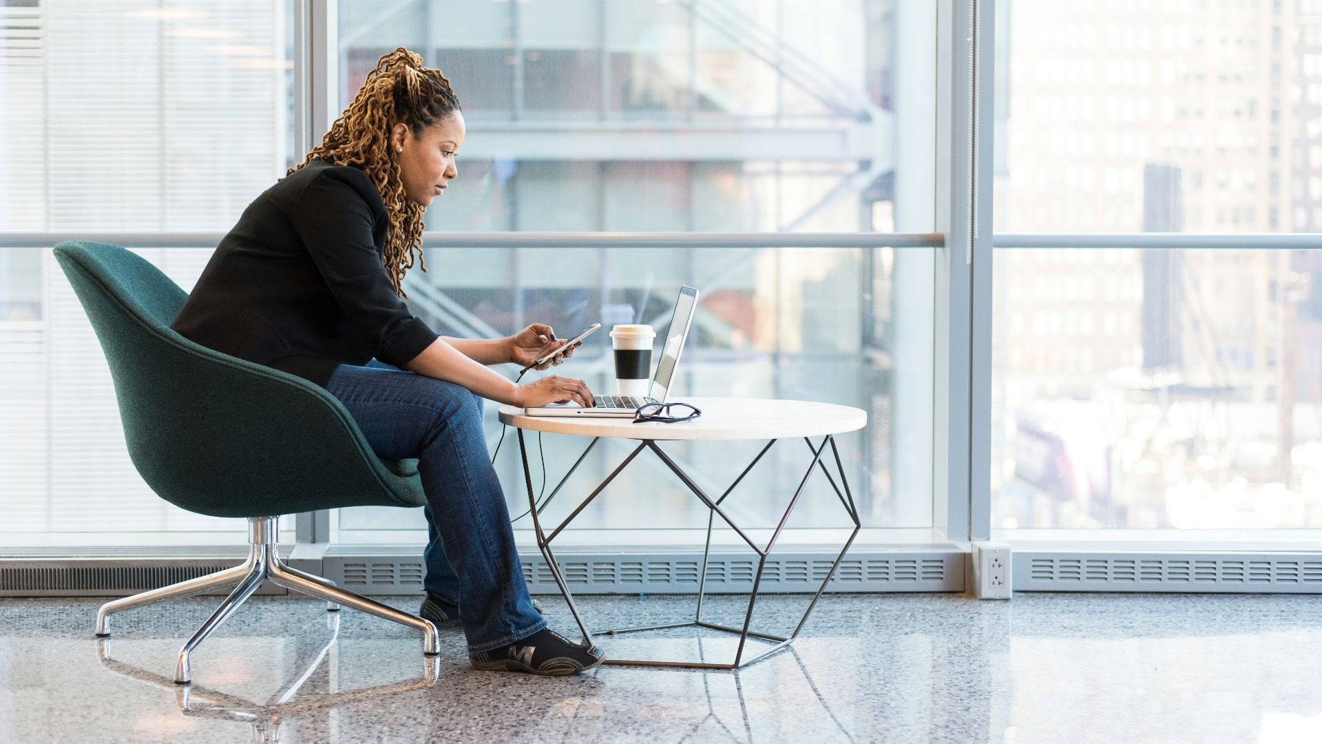 women's black elbow-sleeved blouse