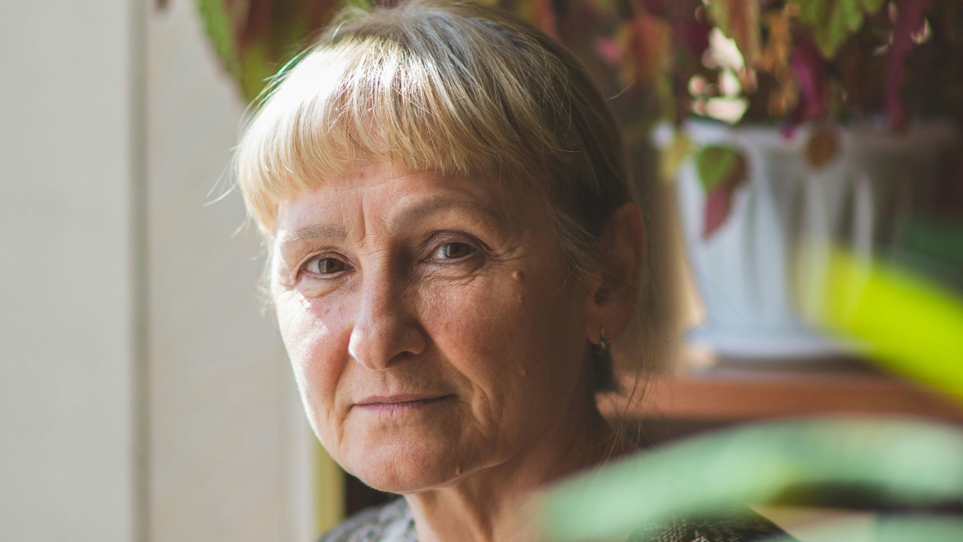 woman in gray and white crew neck shirt