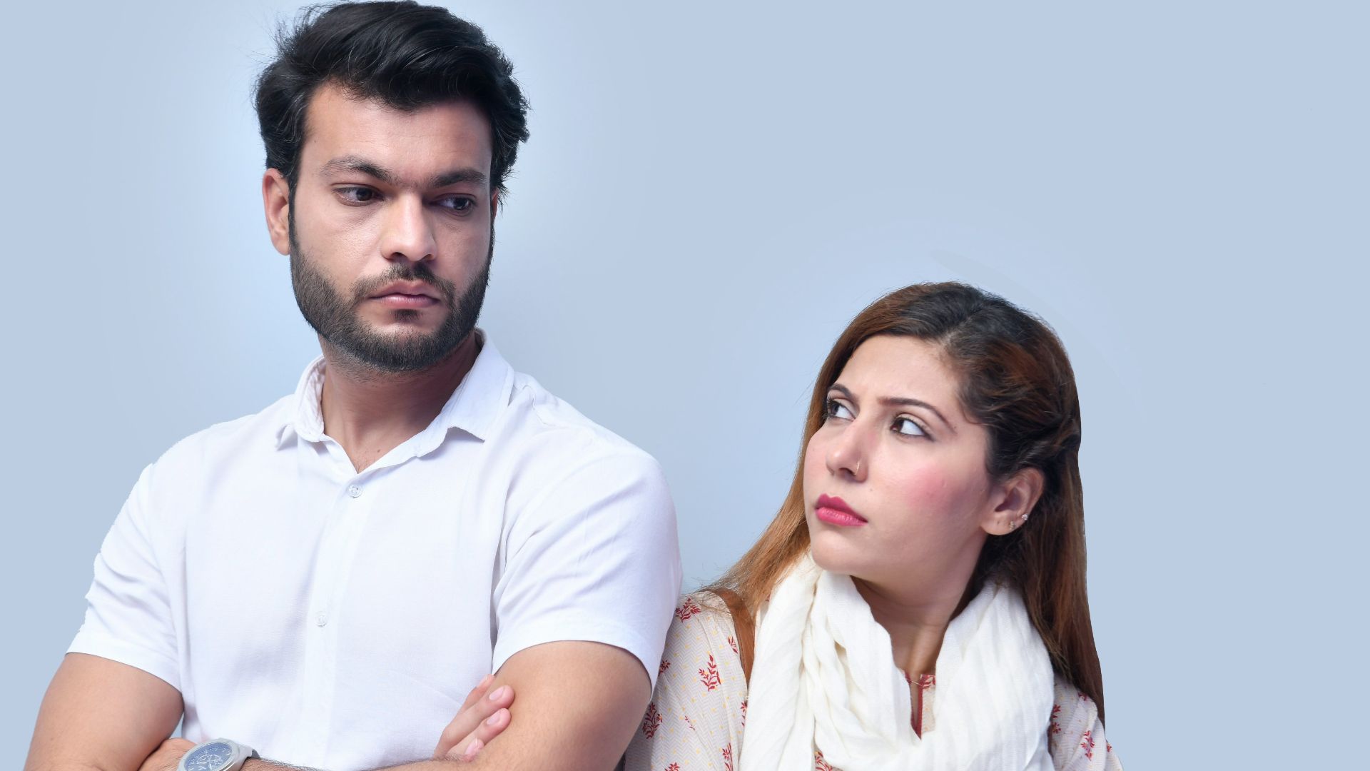 a man and woman posing for a picture