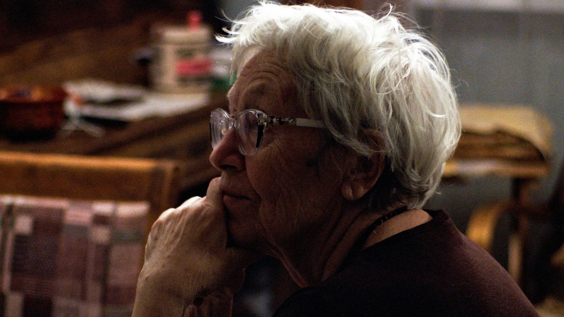 woman in black shirt wearing eyeglasses