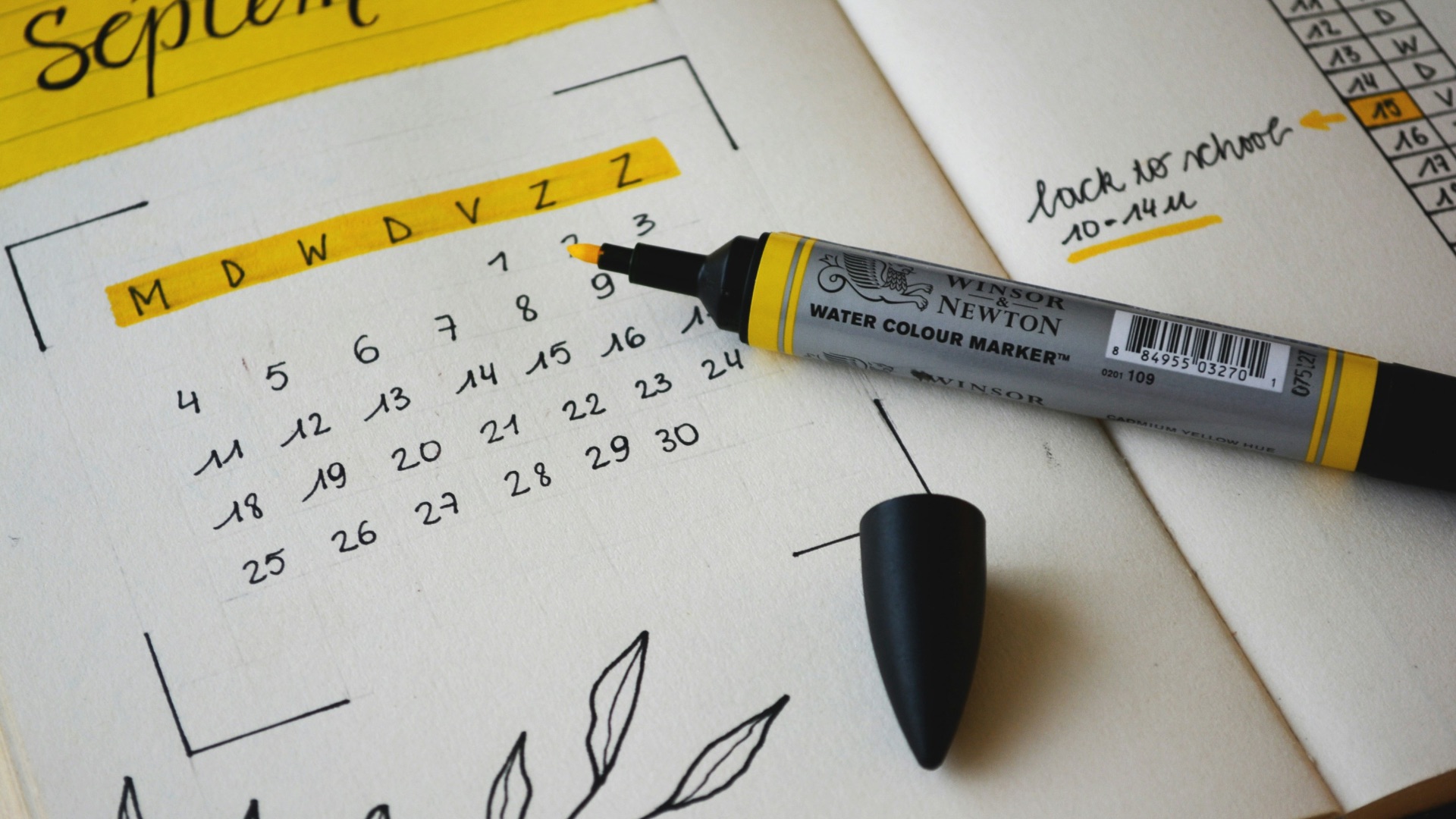 black marker on notebook