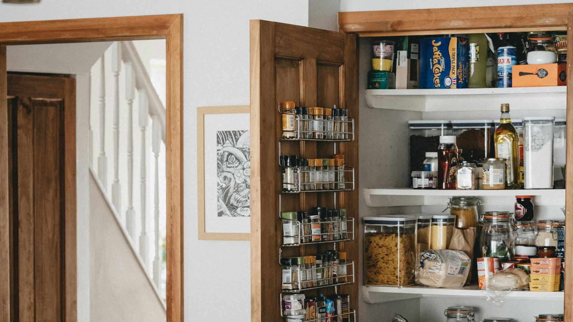 brown wooden shelf with bottles