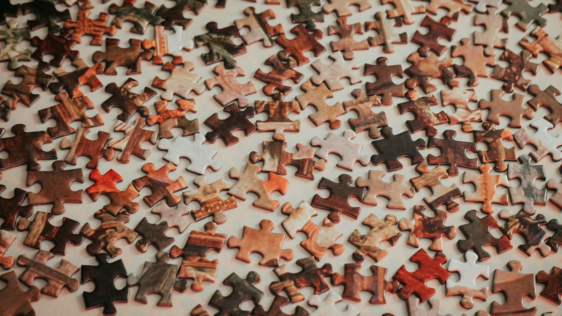 a close up of a puzzle on a table