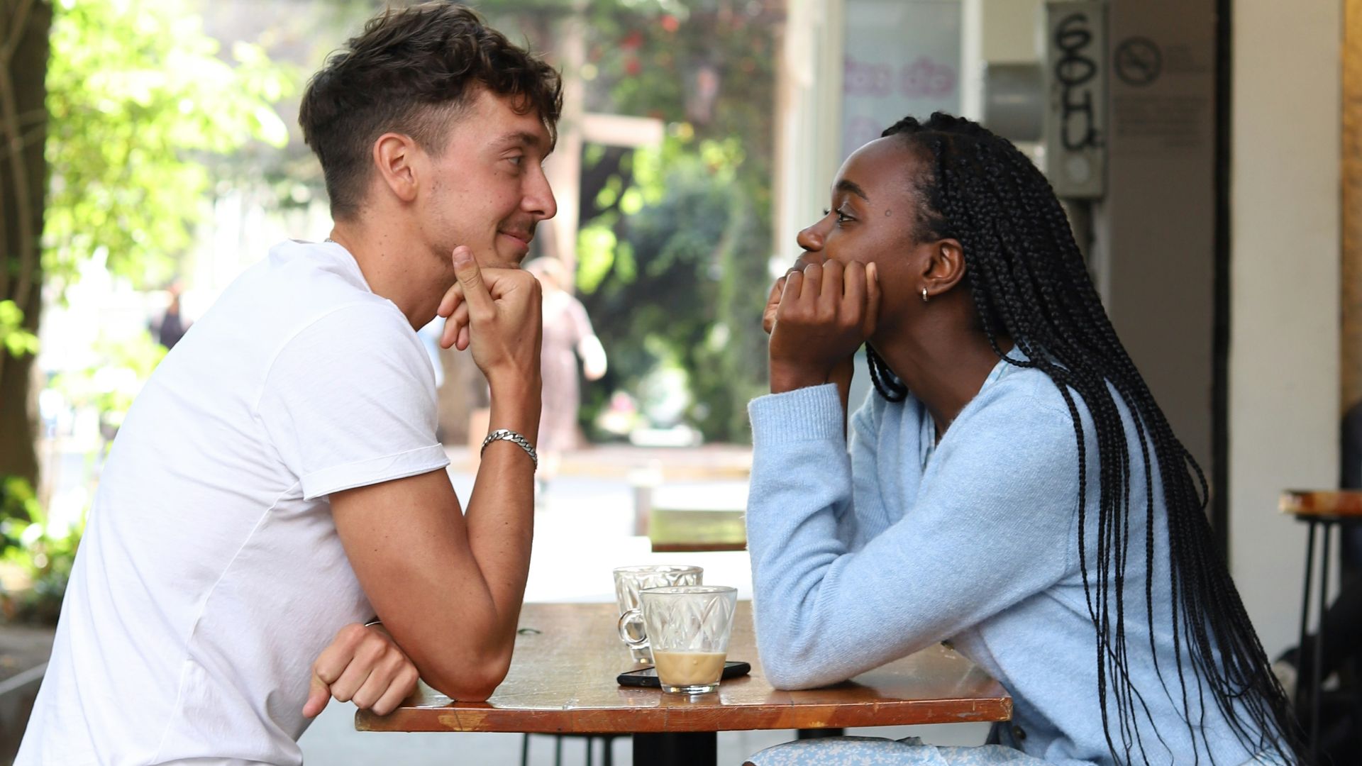 a man and a woman sitting at a table