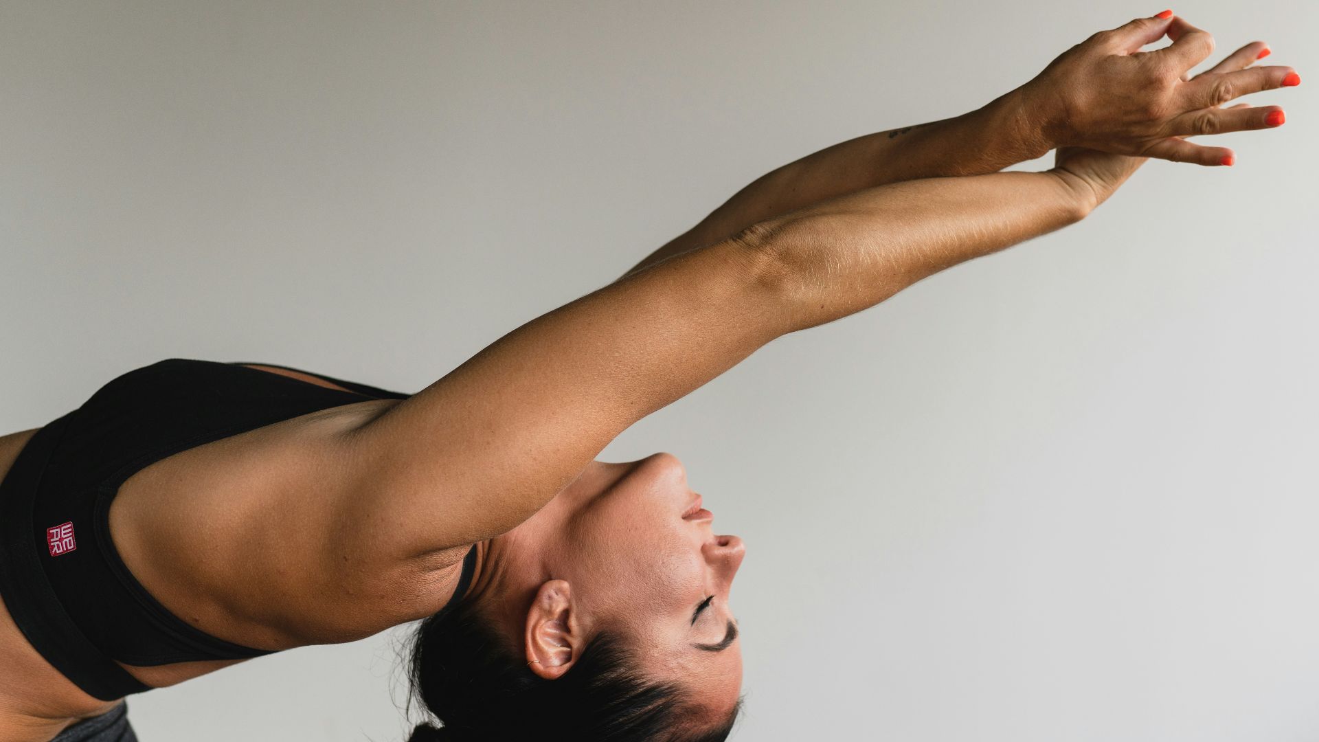 woman stretching arms