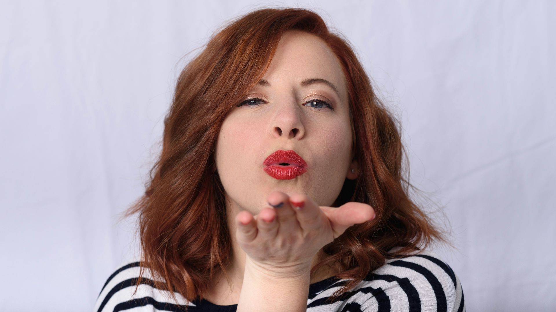 girl in black and white striped shirt