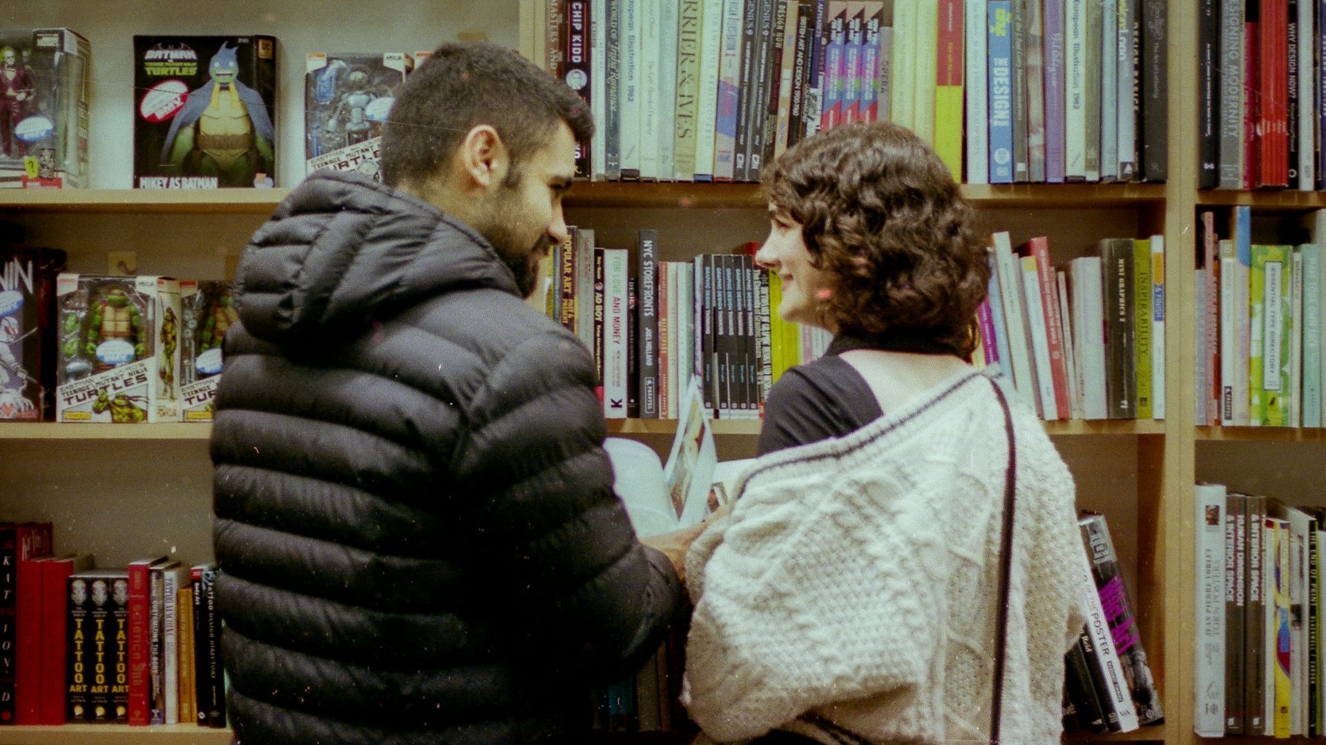 Couple looking at books in a store.