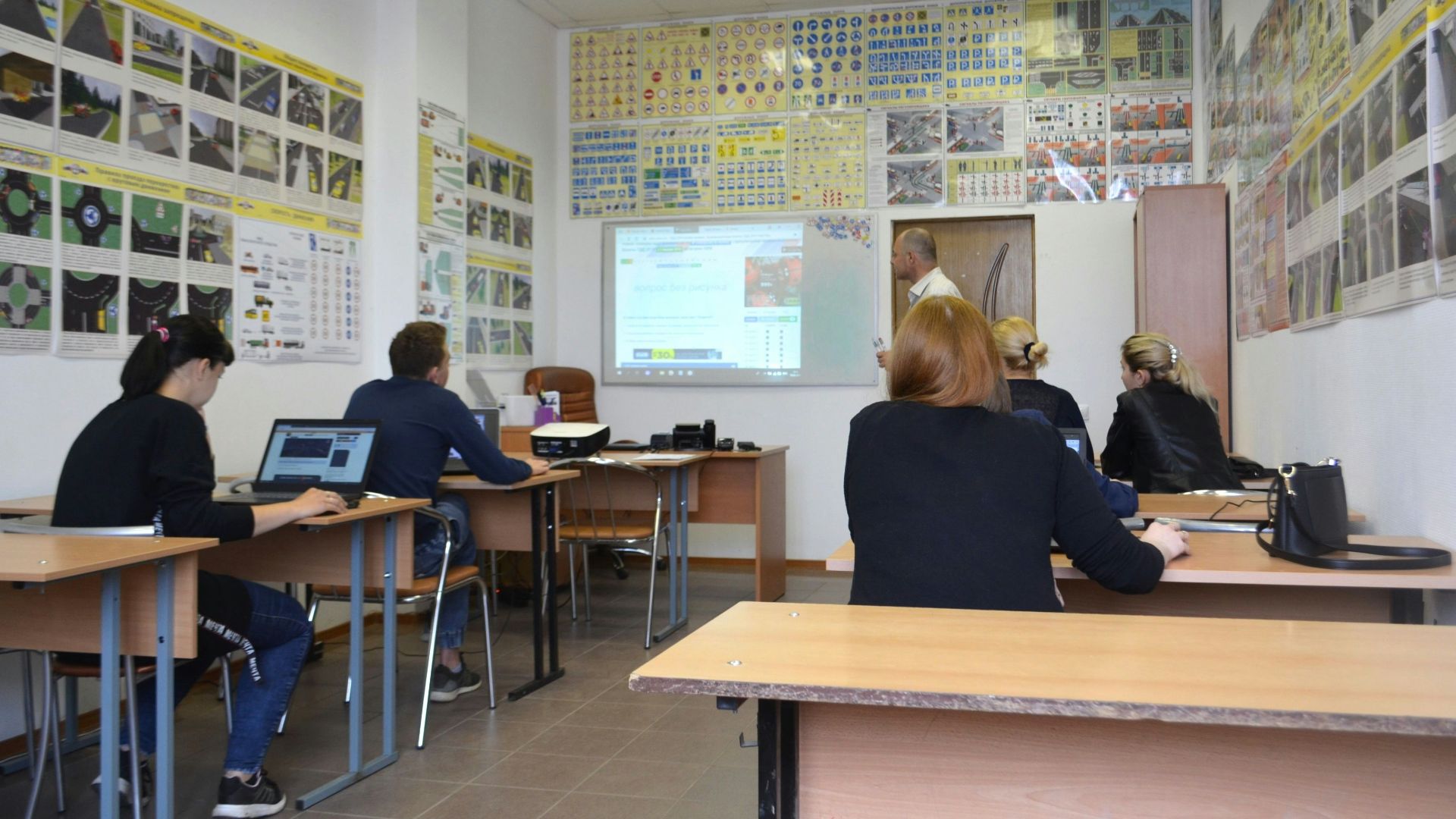 people sitting inside room