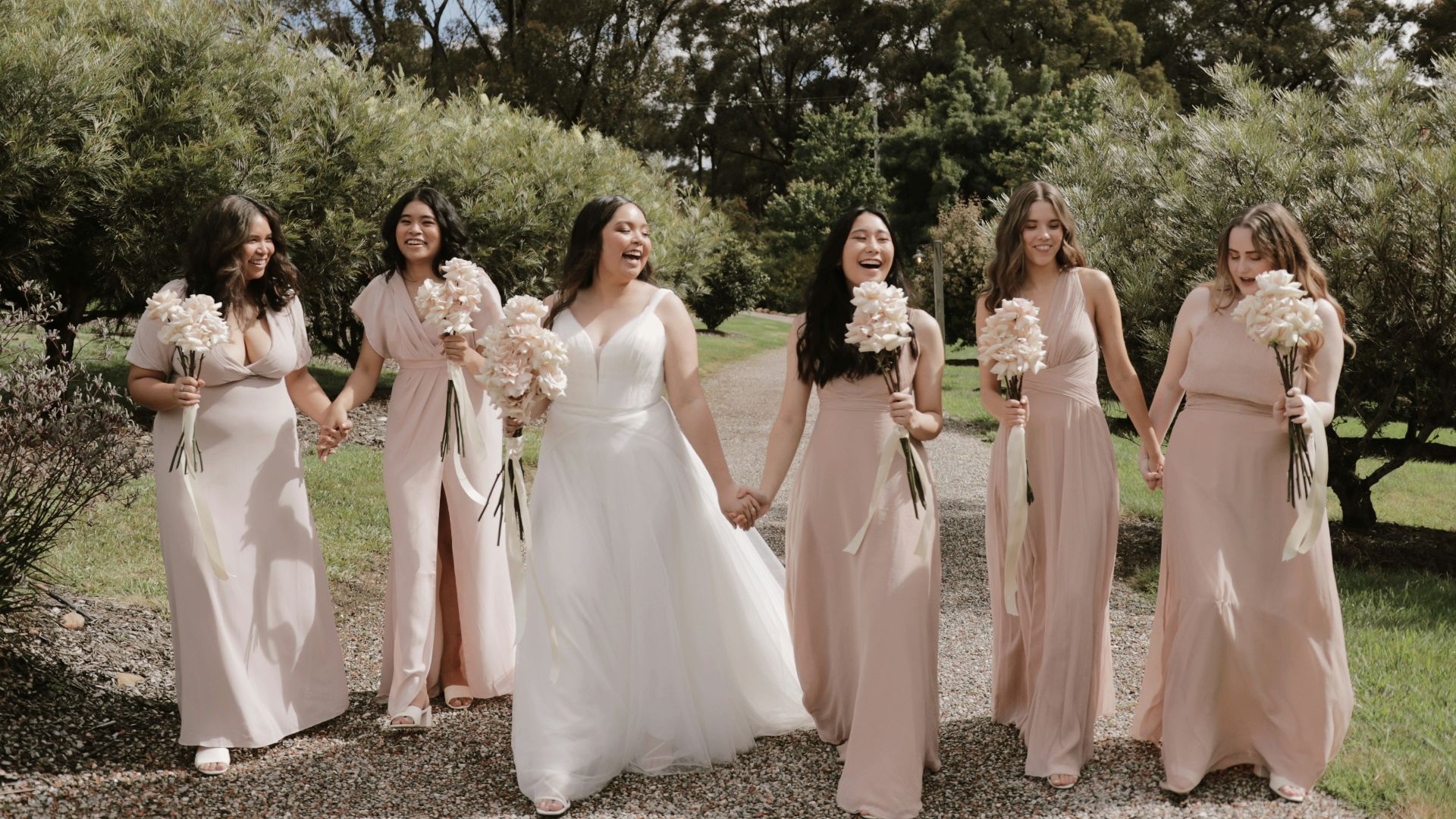 a group of women standing next to each other