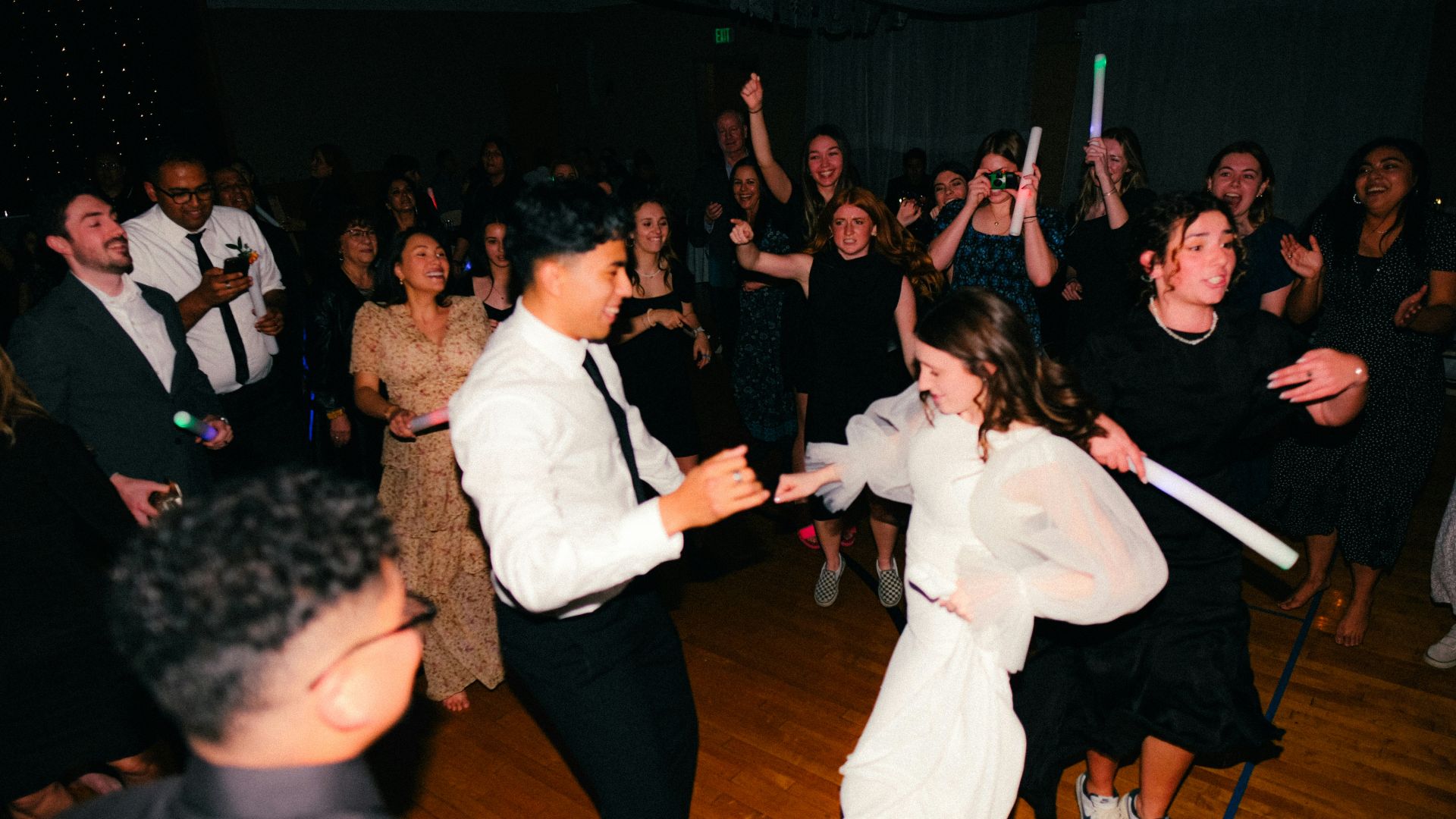 a couple of people that are on a dance floor