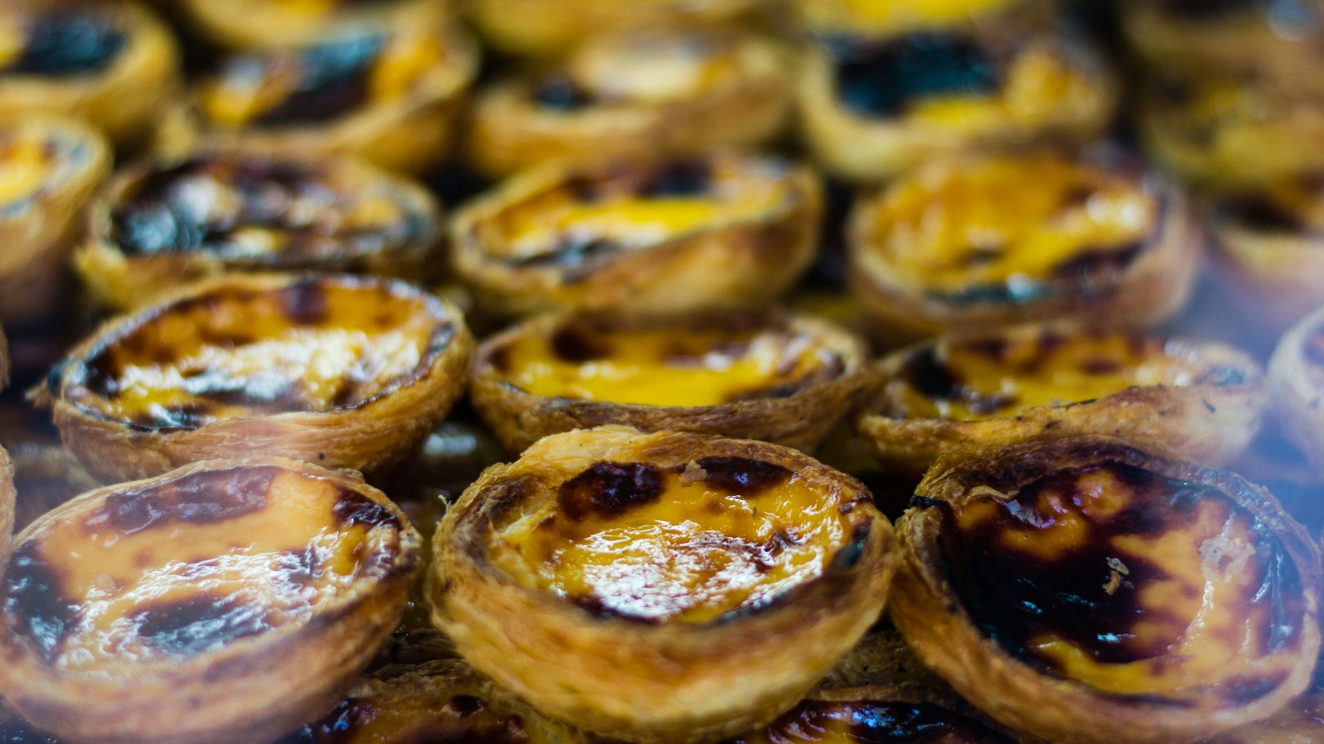 a close up of a bunch of pastries on a table