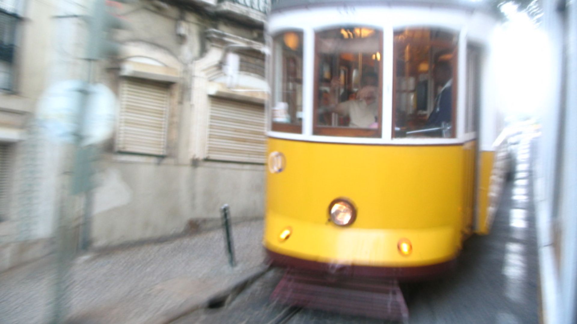 File:Lisbon tram speeding in Alfama.jpg
