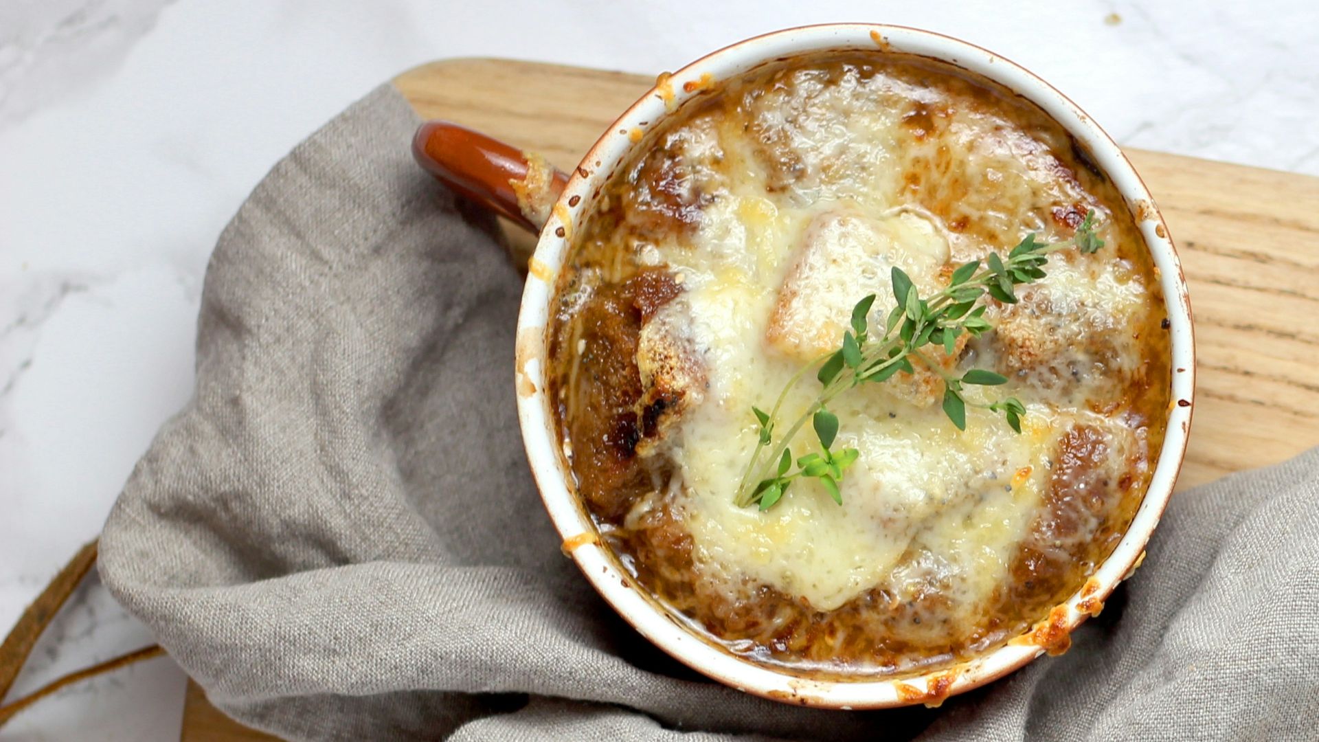 soup with green leaf in teacup