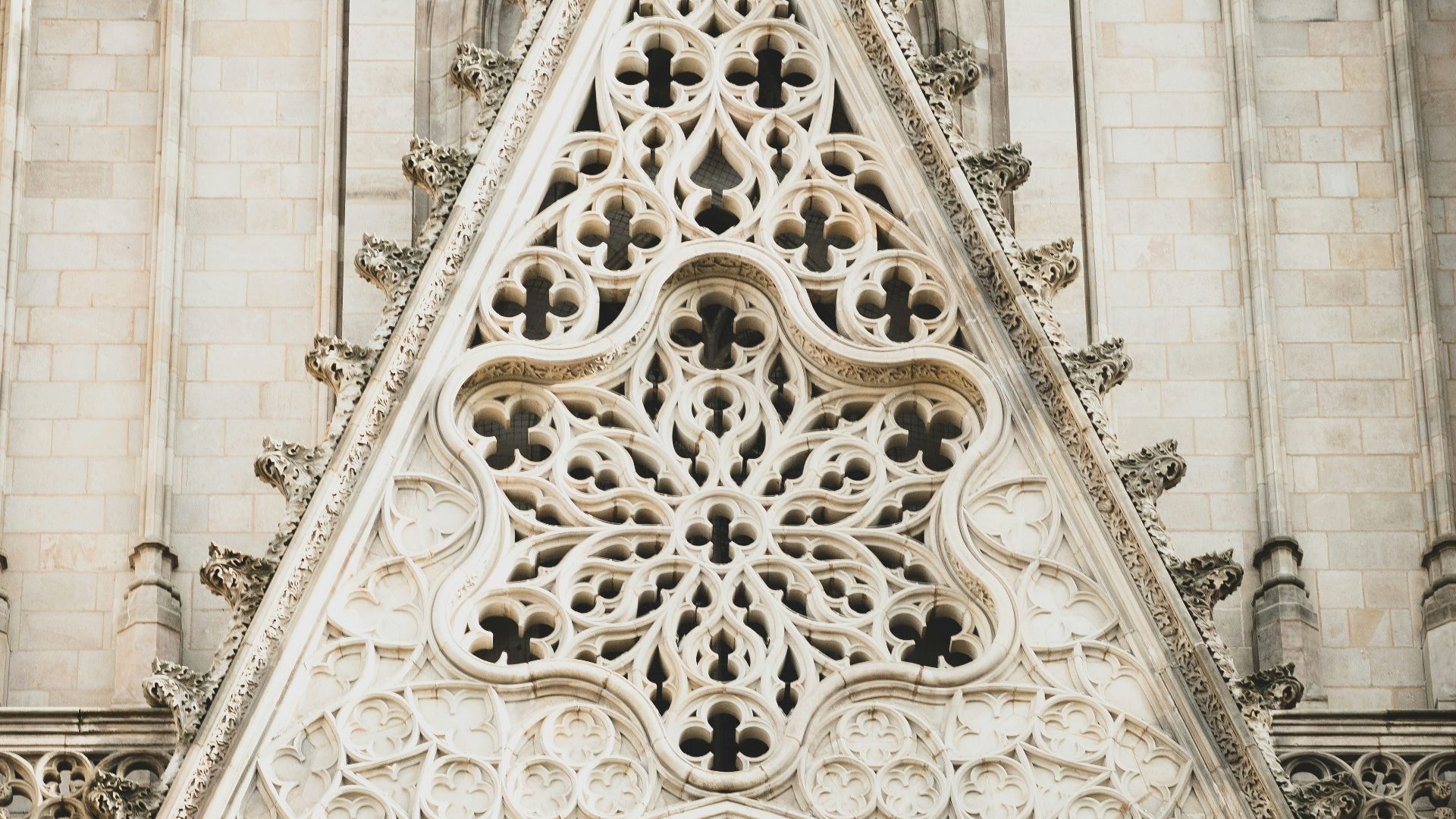 a very tall building with a clock on it's side